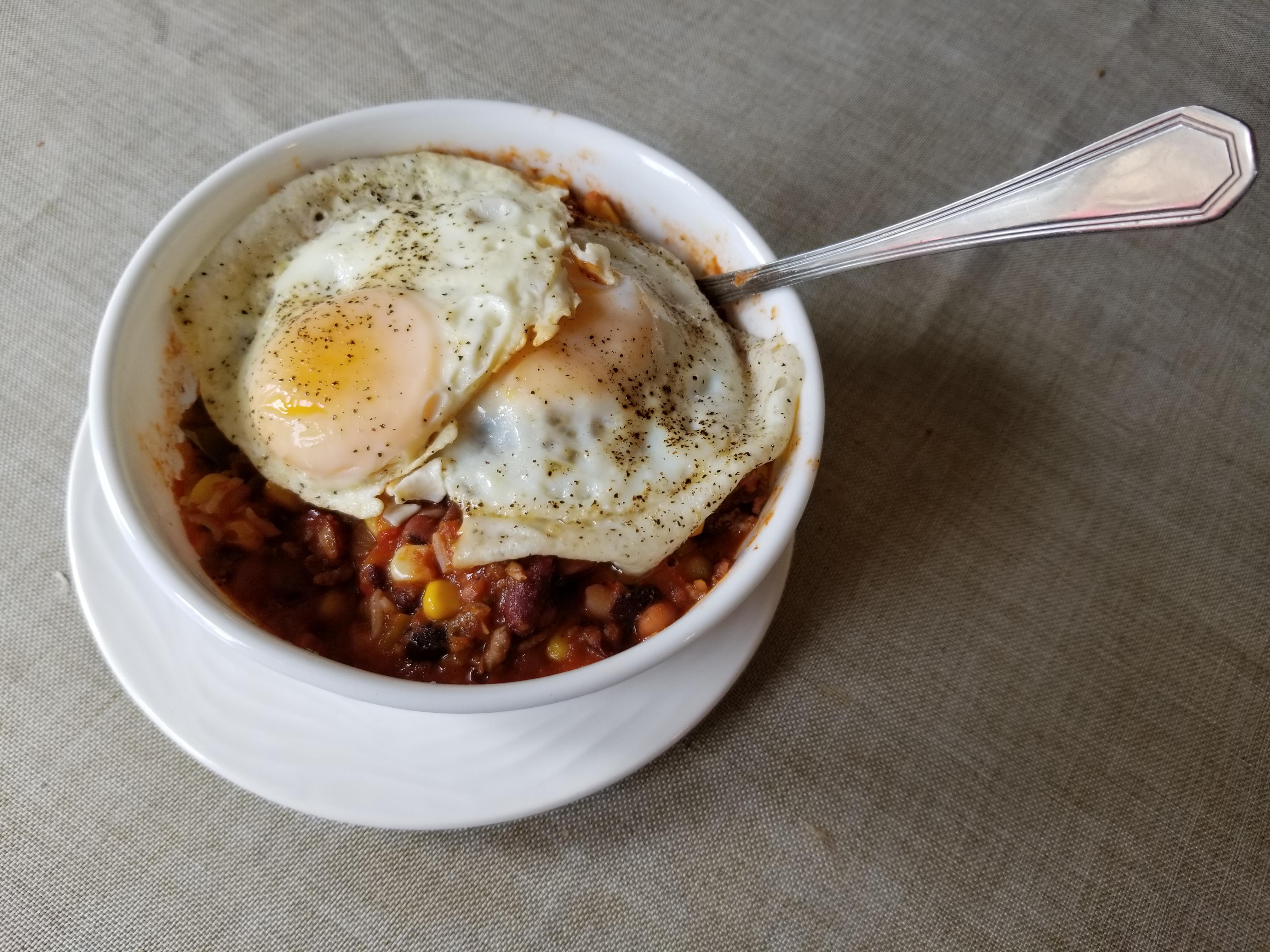 Fried Eggs on Chili Over Basmati Rice r/PutAnEggOnIt