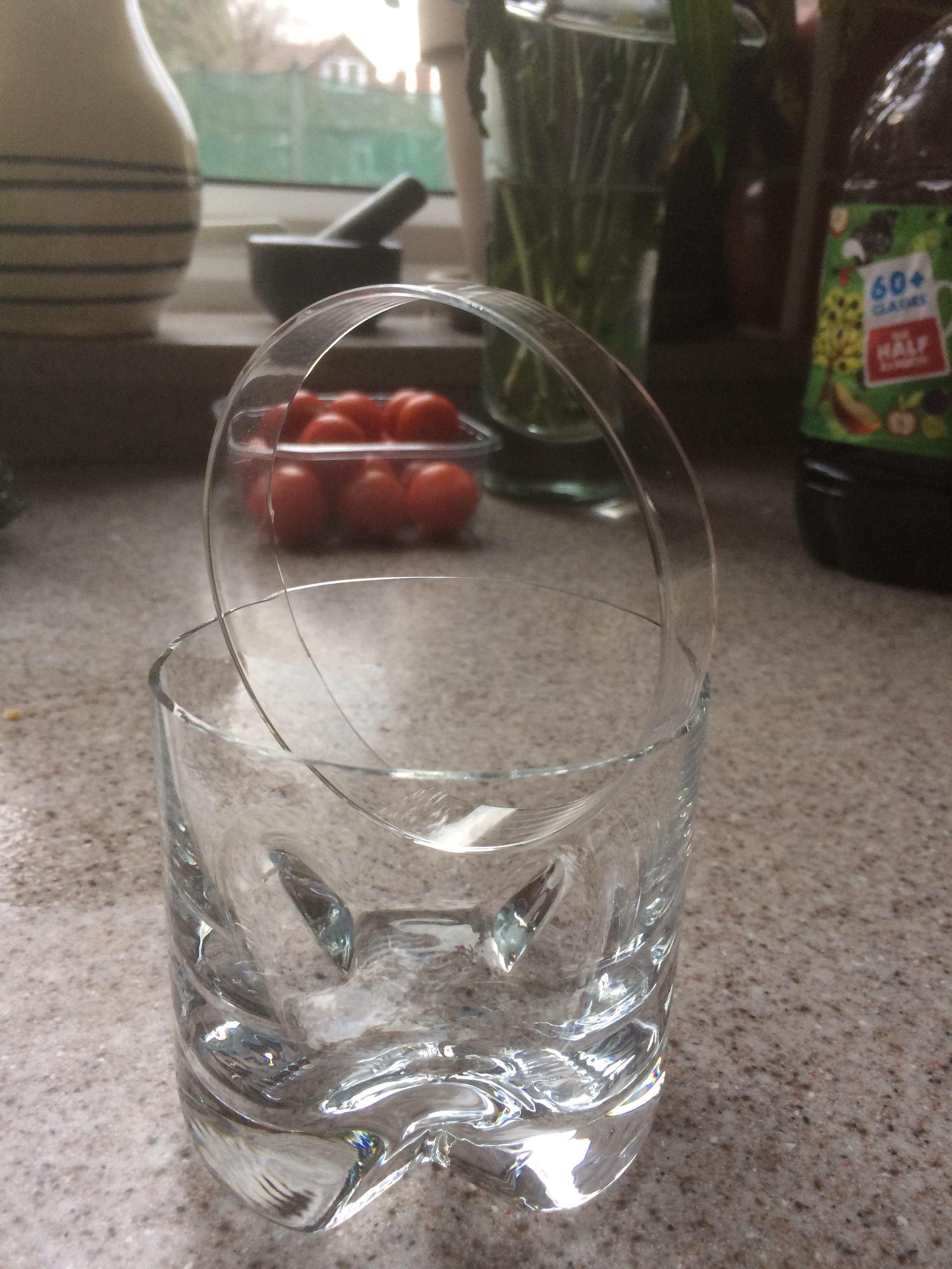 A glass tumbler broke in our dishwasher this morning in a very odd way