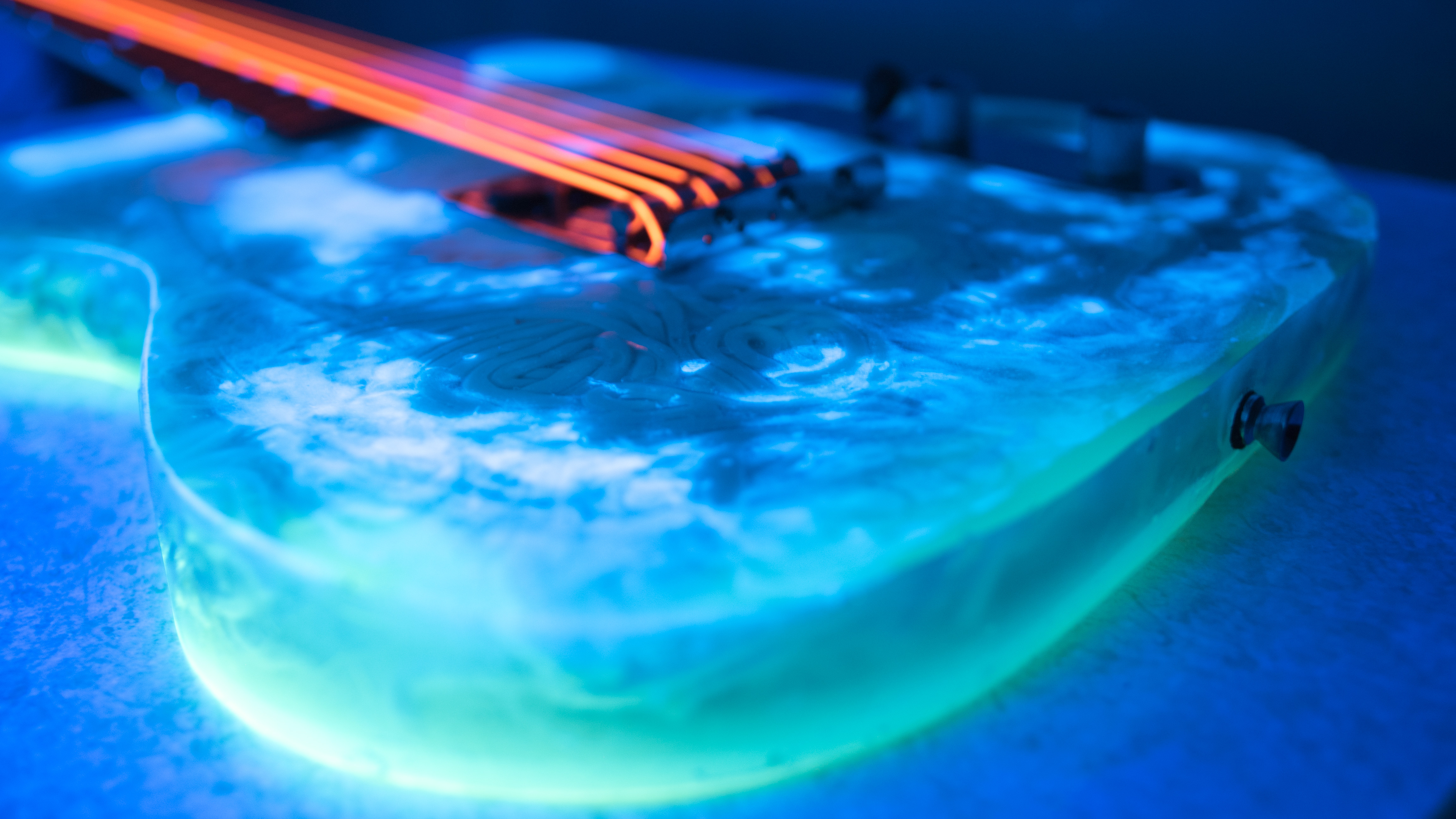 My self built Ramen Noodle Guitar with UV active colors & strings r