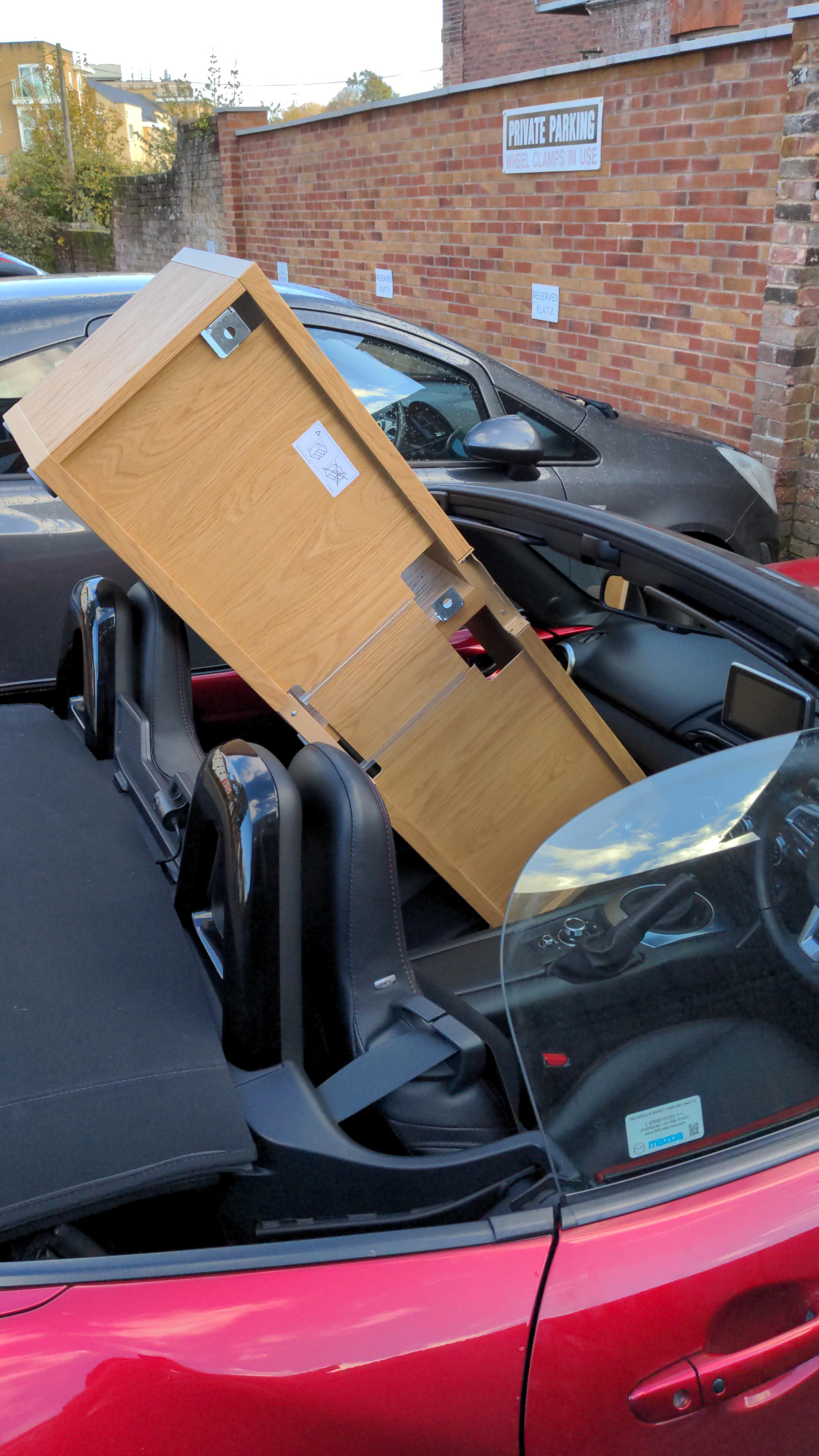 Standard furniture pickup one hand holding in place on the