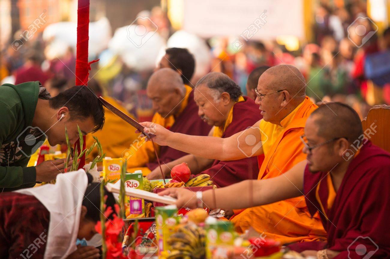 tibetan Buddhist monks near stupa Boudhanath during festive Puja of H.H. Drubwang Padma Norbu
