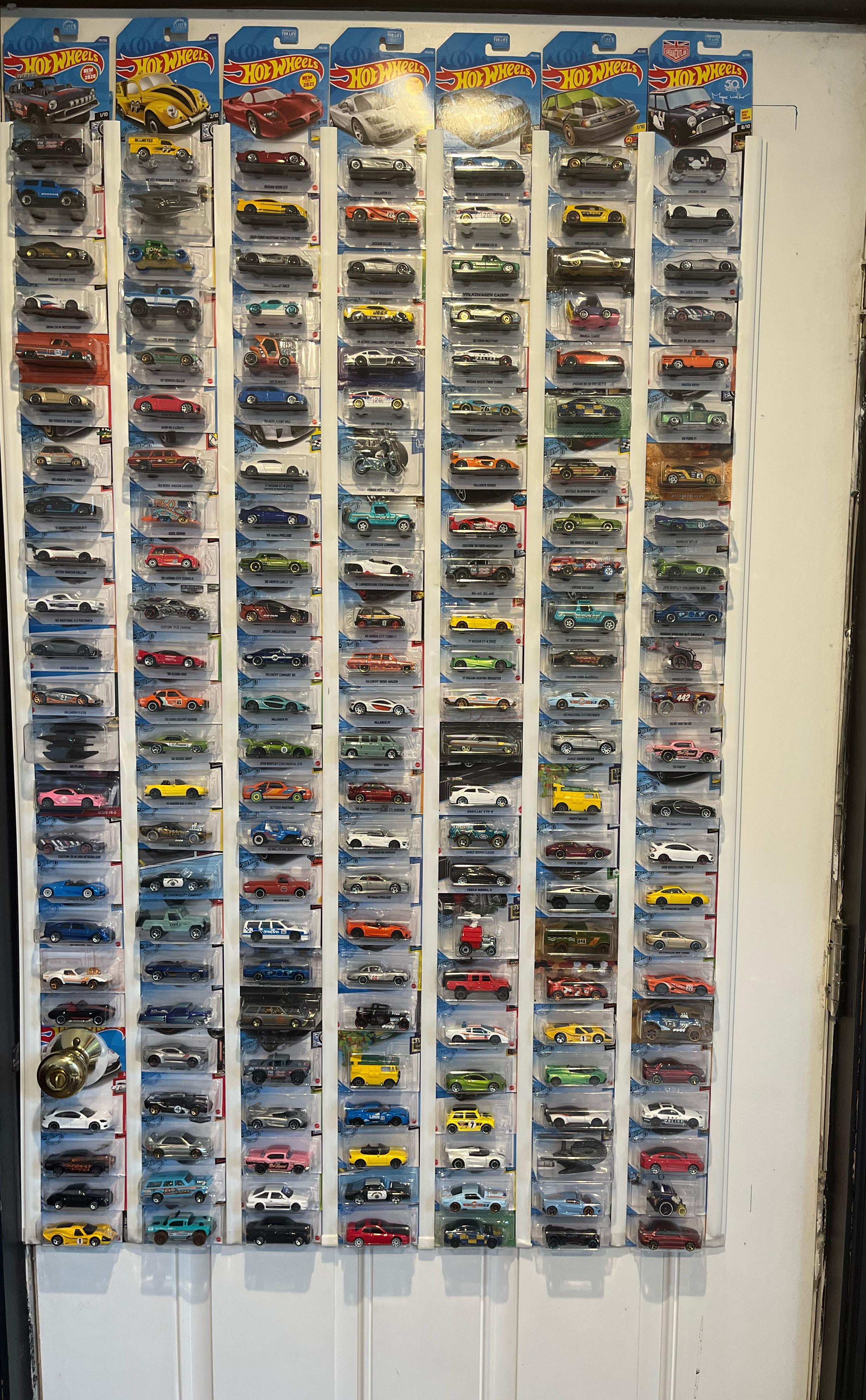 Didn’t realize how many hot wheels it takes to cover a door !!! Looks