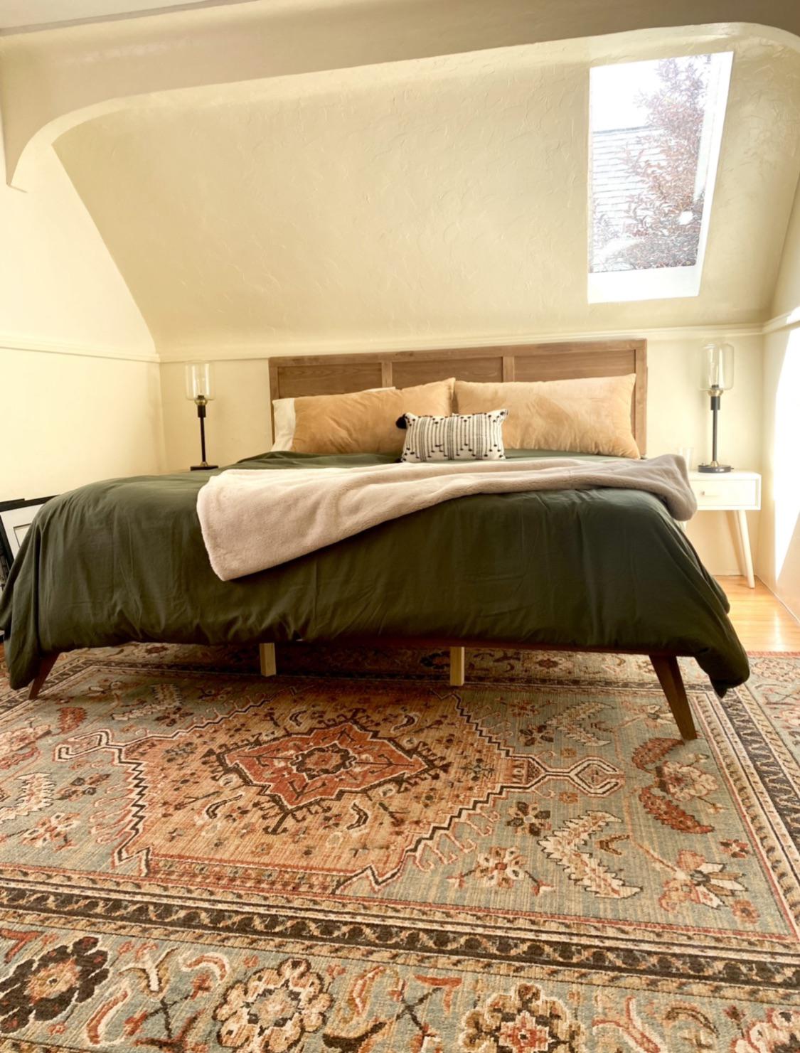 Our Denver, CO bedroom with a skylight that lets us sleep under the