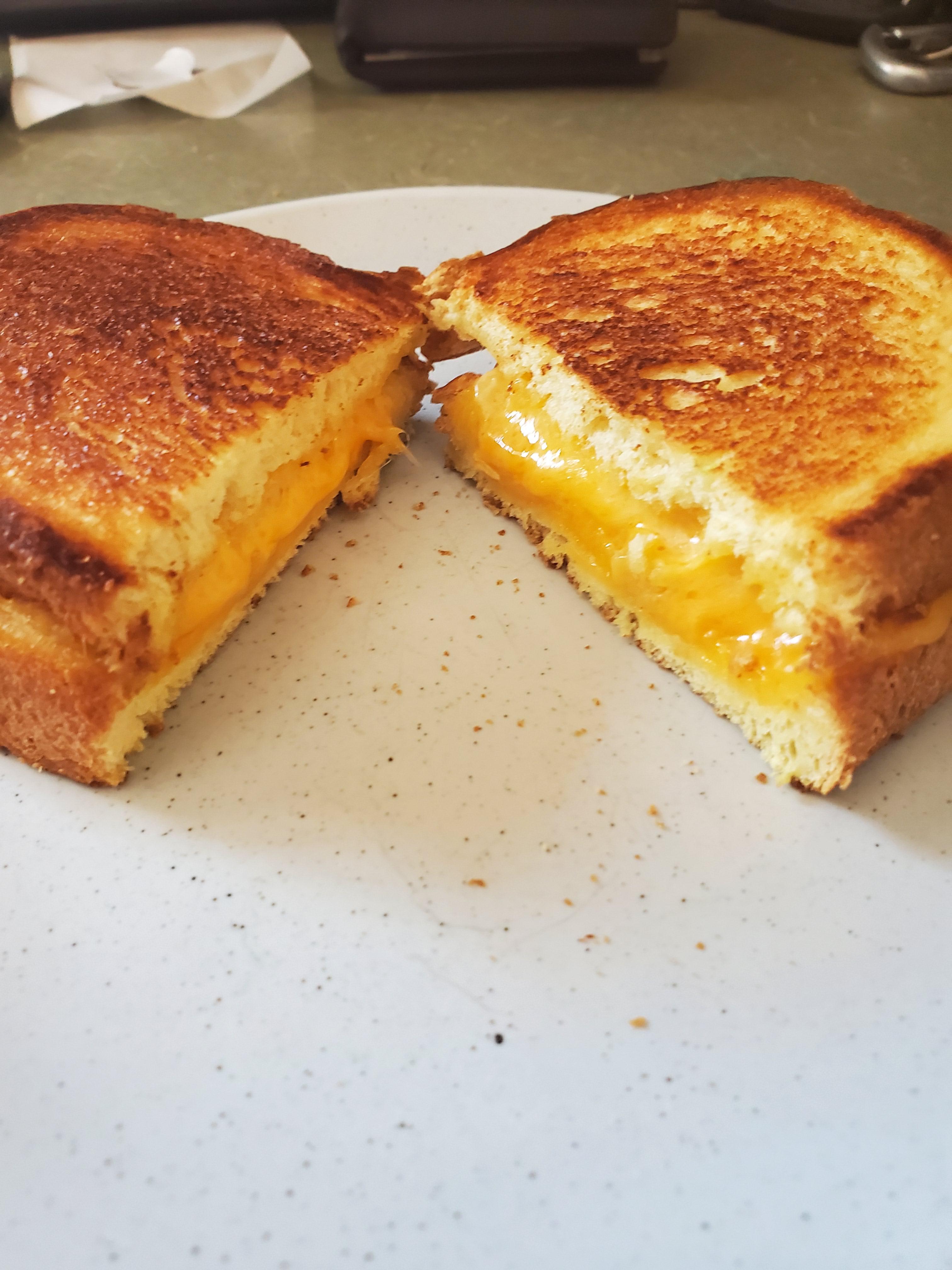 Sharp cheddar, brioche bread. r/grilledcheese