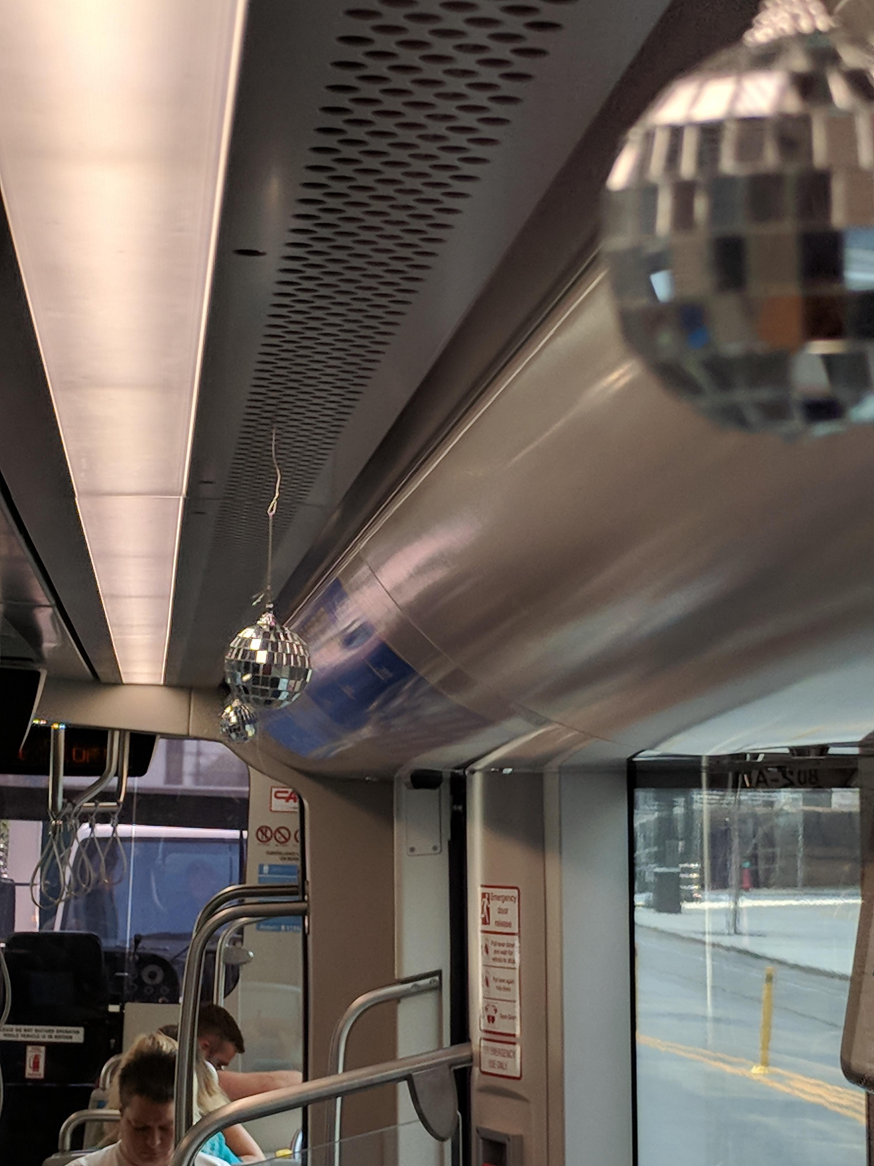 Someone put disco balls in the street cars r/kansascity
