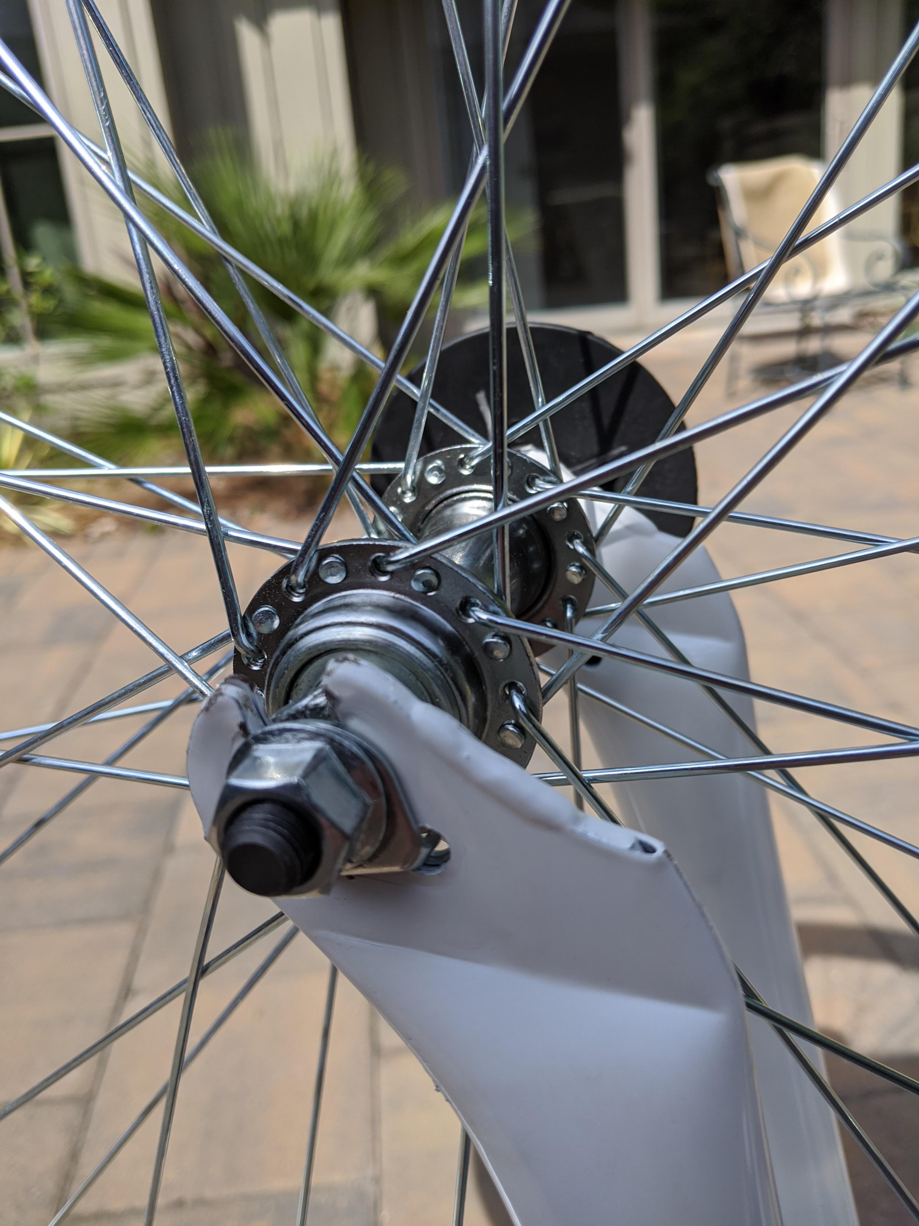 Bought this bike online and I'm struggling getting the front wheel to spin freely. When I spin