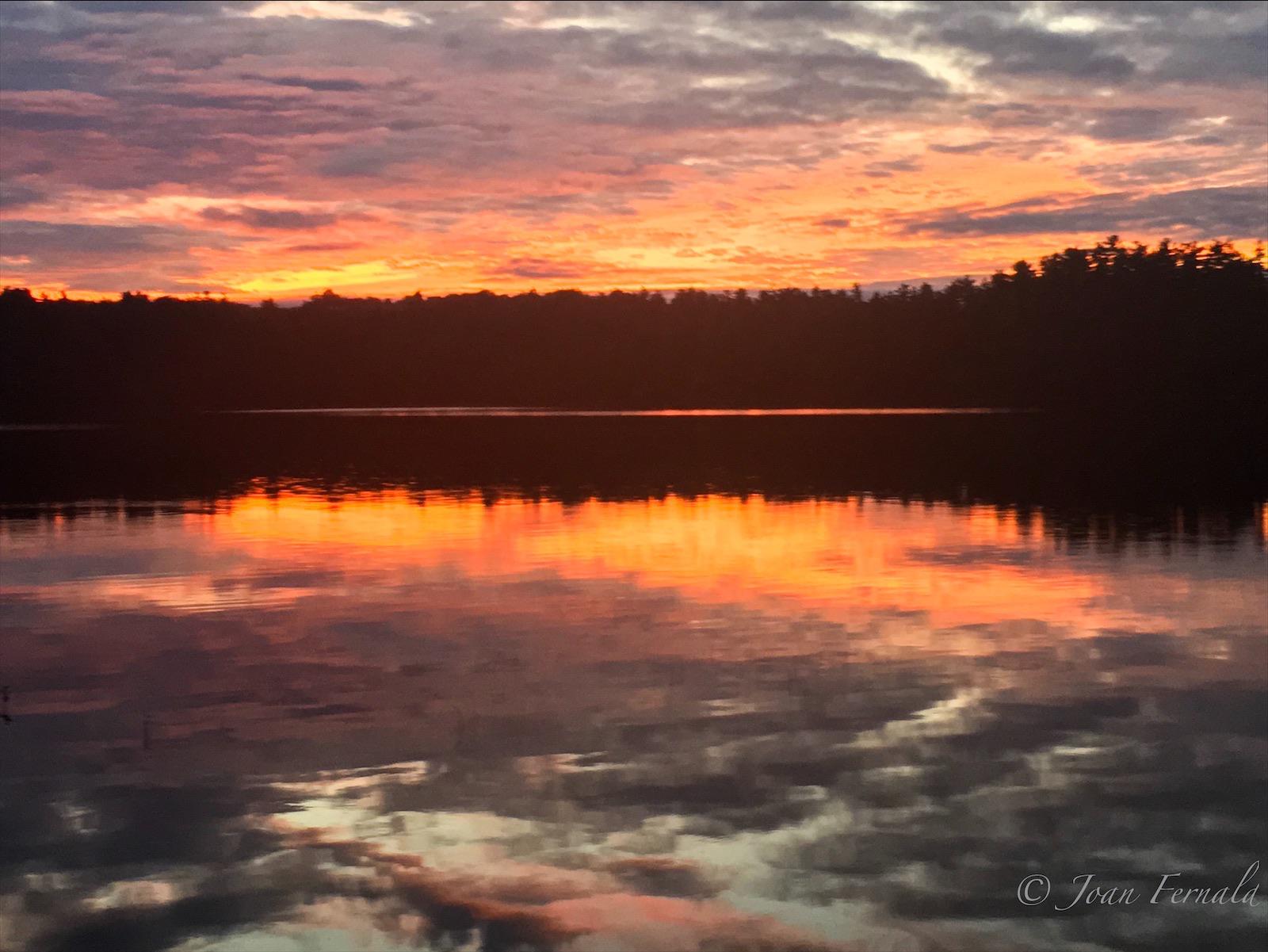 Perfect combination of clouds, color and water. New Gloucester, Maine