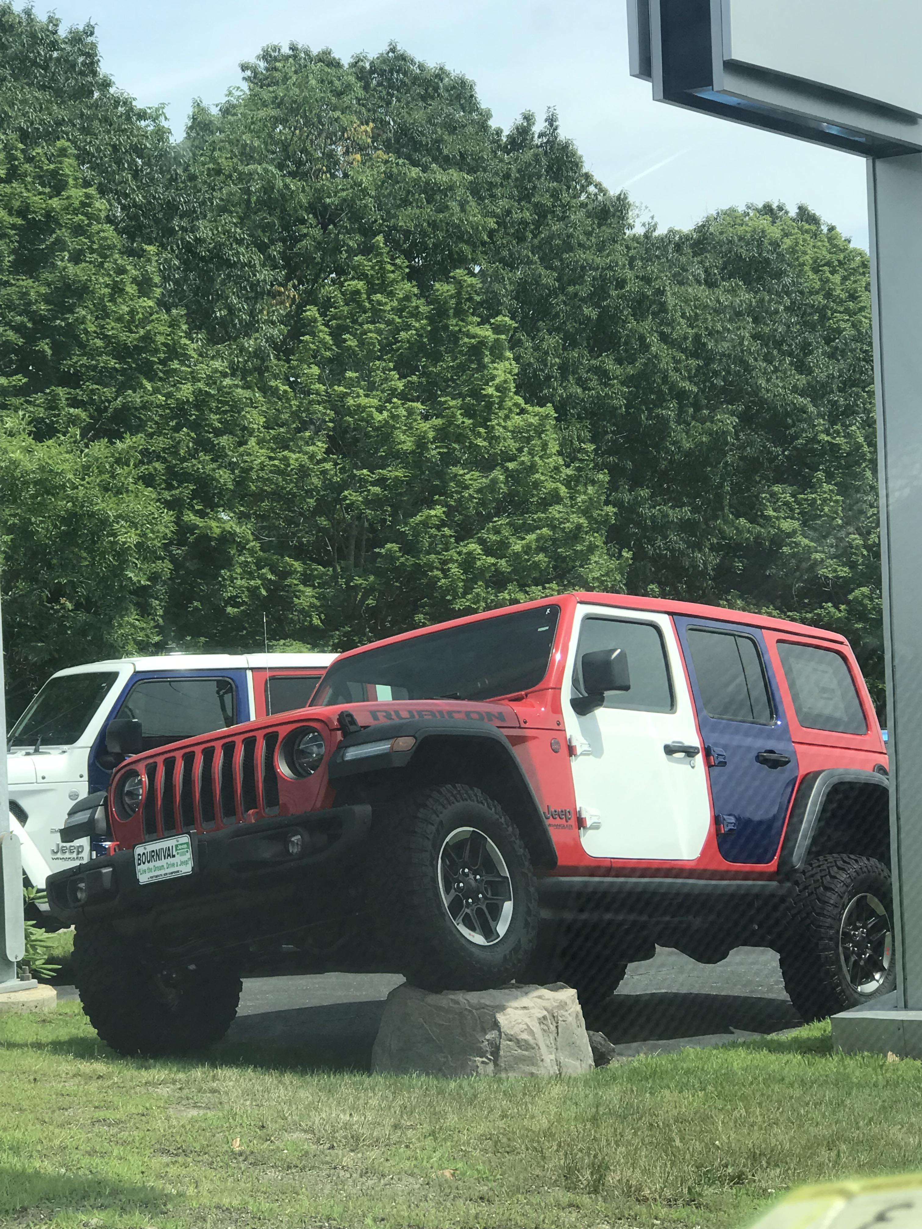 Local dealership got creative for the 4th r/Jeep