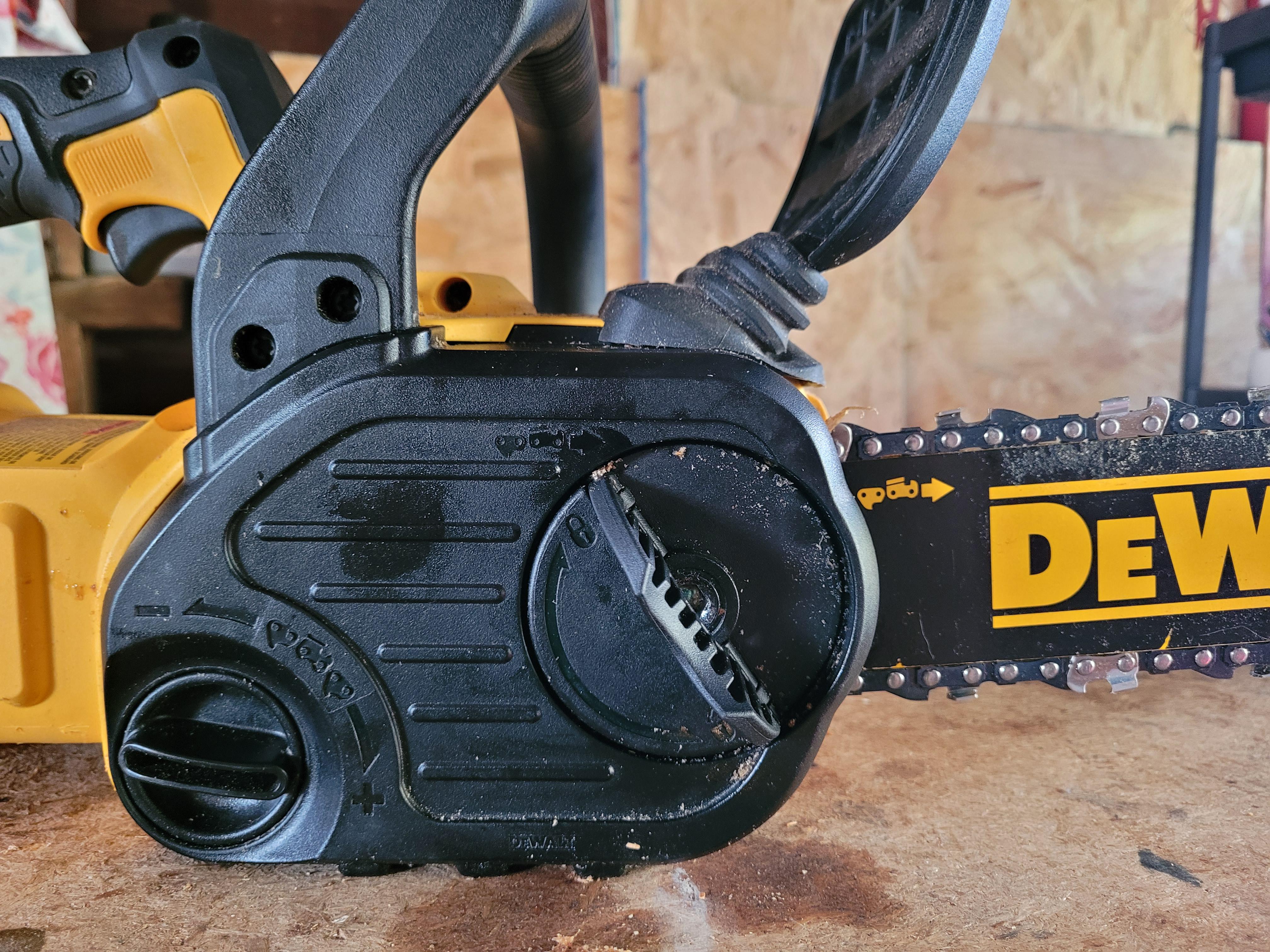 Chainsaw 20v 12inch Sprocket cover is stuck, or I'm an idiot. Maybe