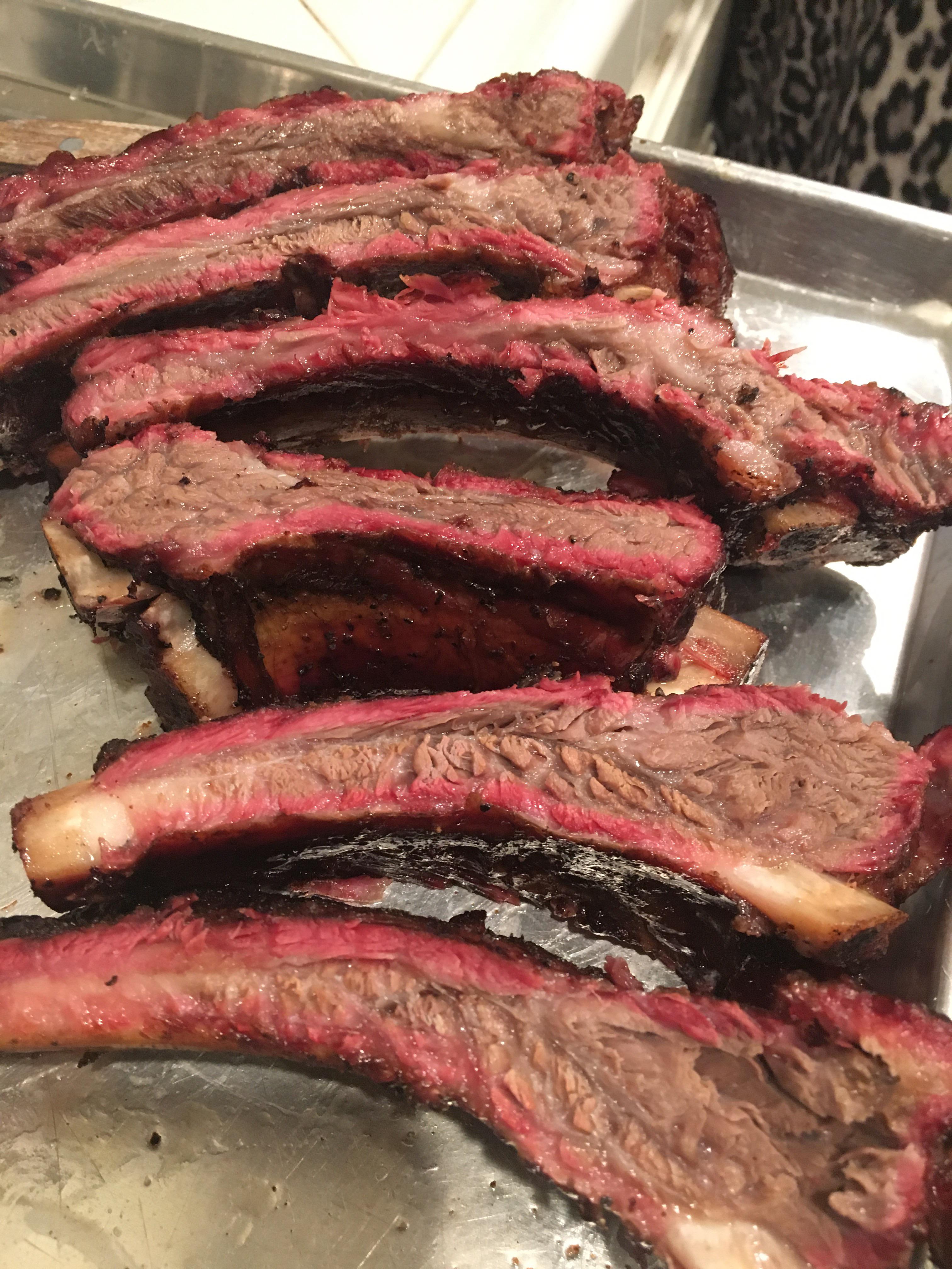 Beef back ribs on the UDS, enjoy your bbq this weekend! r/BBQ