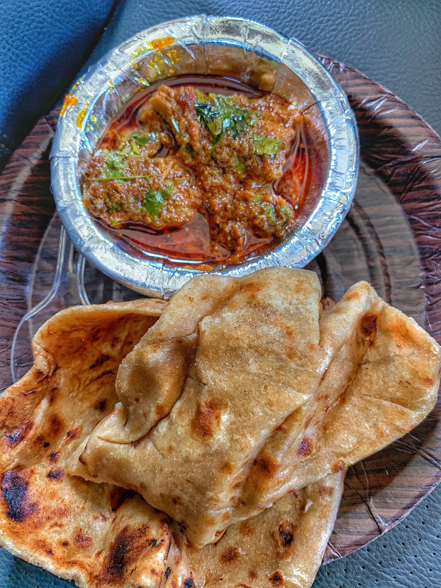 Boti and Roti Mutton curry with a paratha (flat bread) [OC][1275X4375
