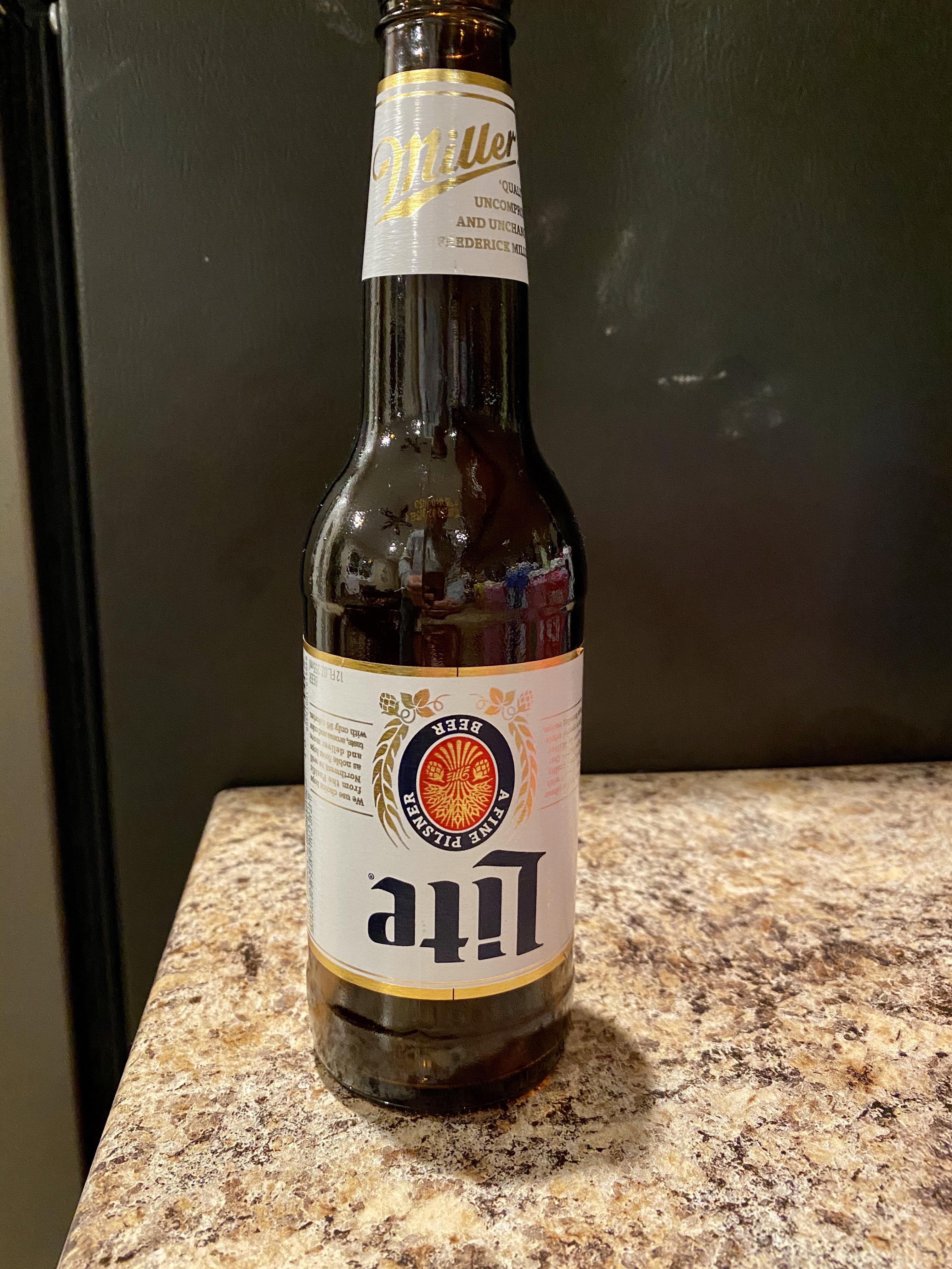 Miller Lite bottle with an upside down label r/mildlyinteresting