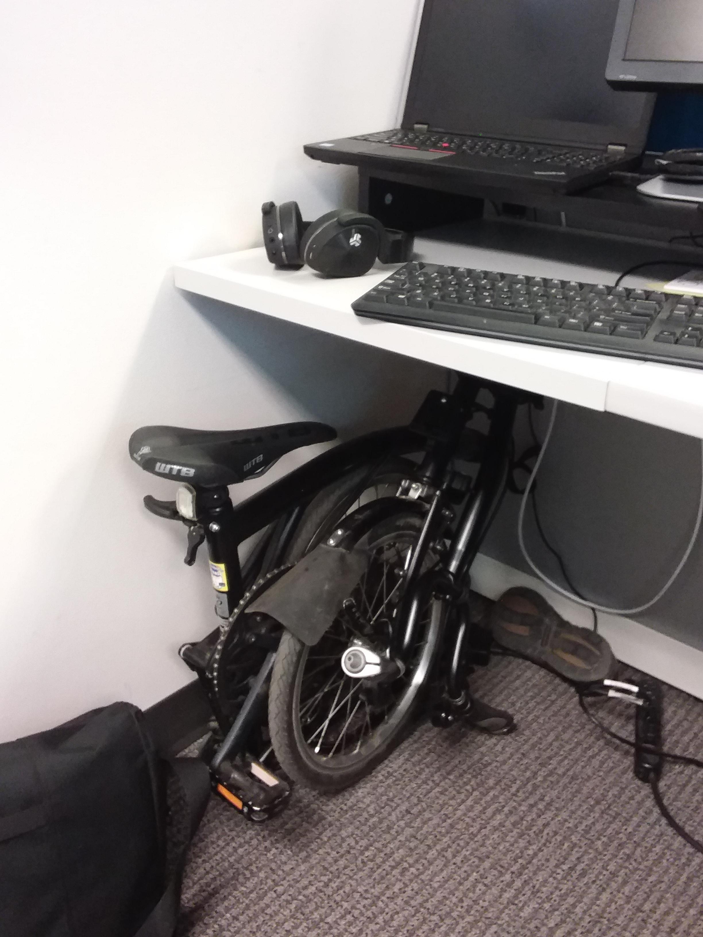 No need to use office bike rack. Fits nicely under desk. r/Brompton