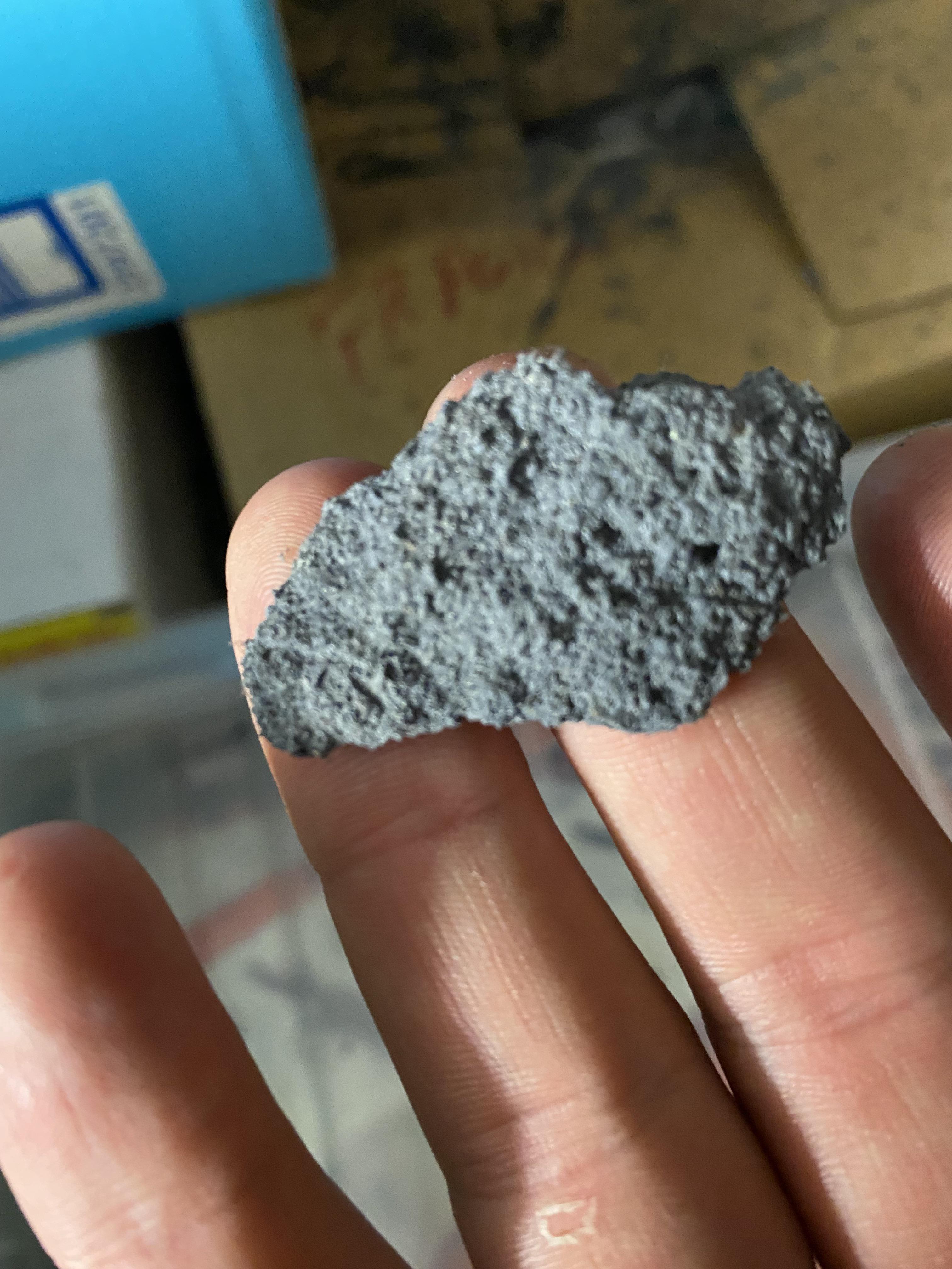 Load of crumbly grey material in loft. There was a plastic sheeting