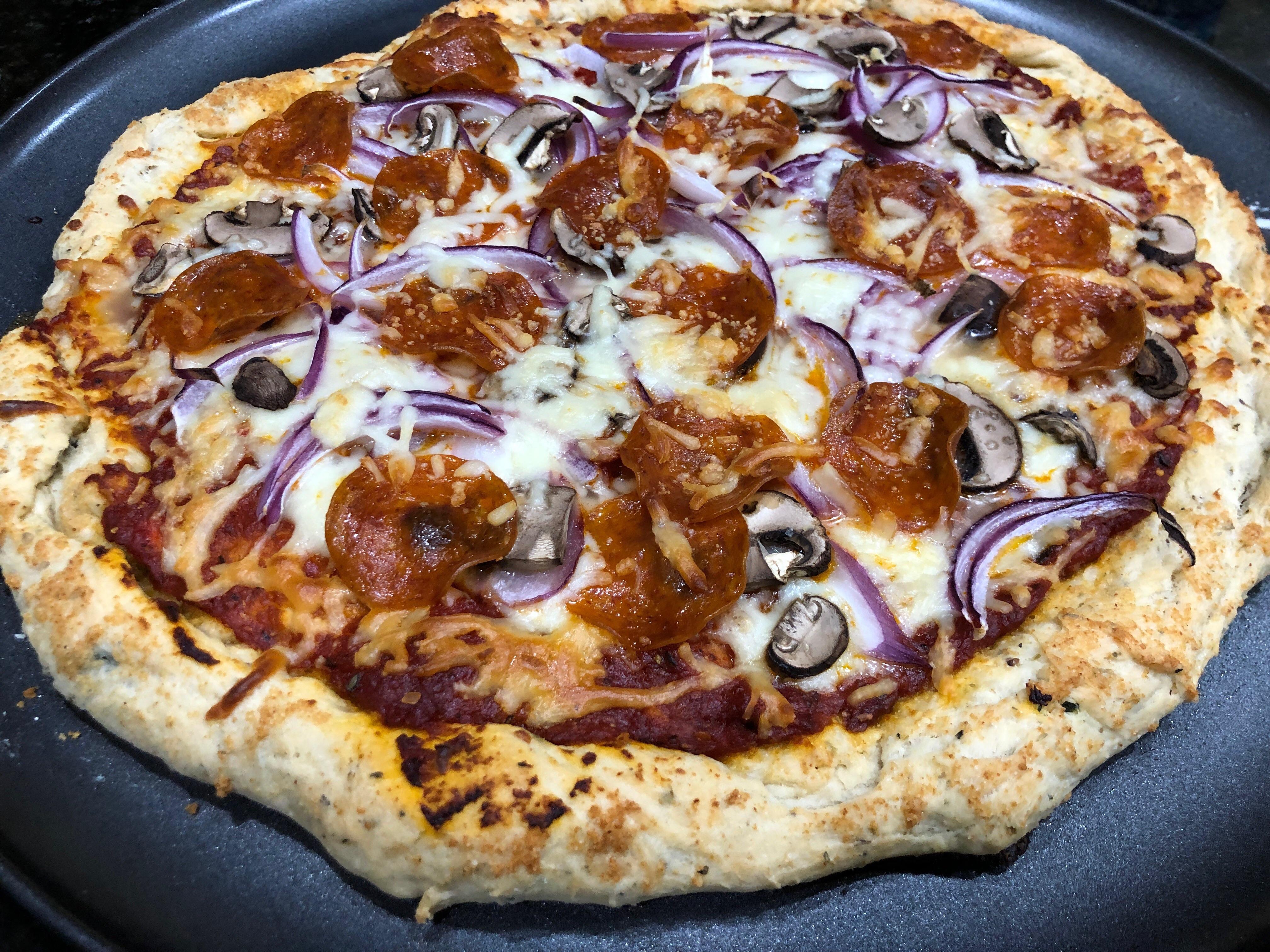 Our first attempt at homemade pizza. All fresh ingredients, pepperoni