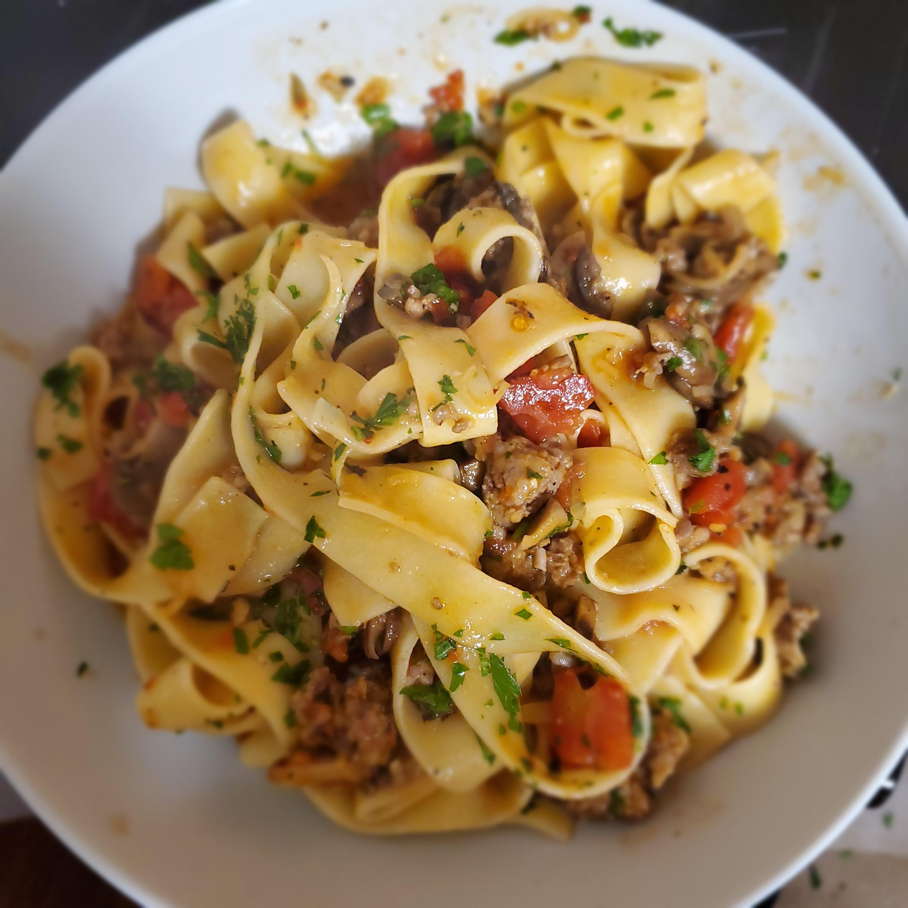 Pappardelle with hot Italian sausage, leeks, mushrooms and fire roasted