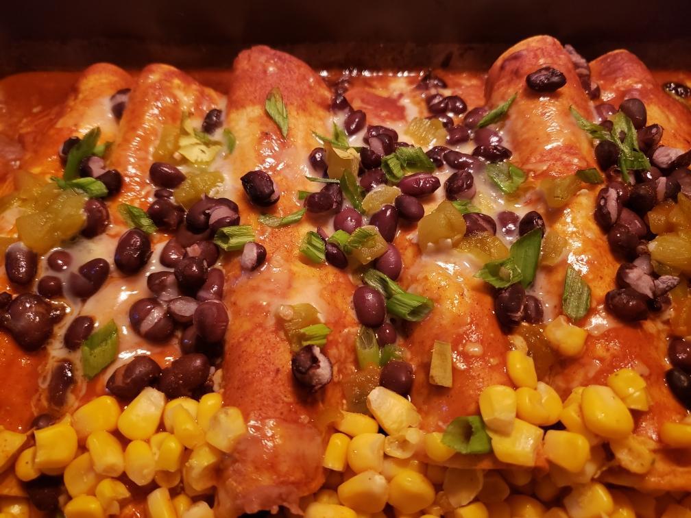 [homemade] Beef and cheese enchiladas with corn, refried beans, and