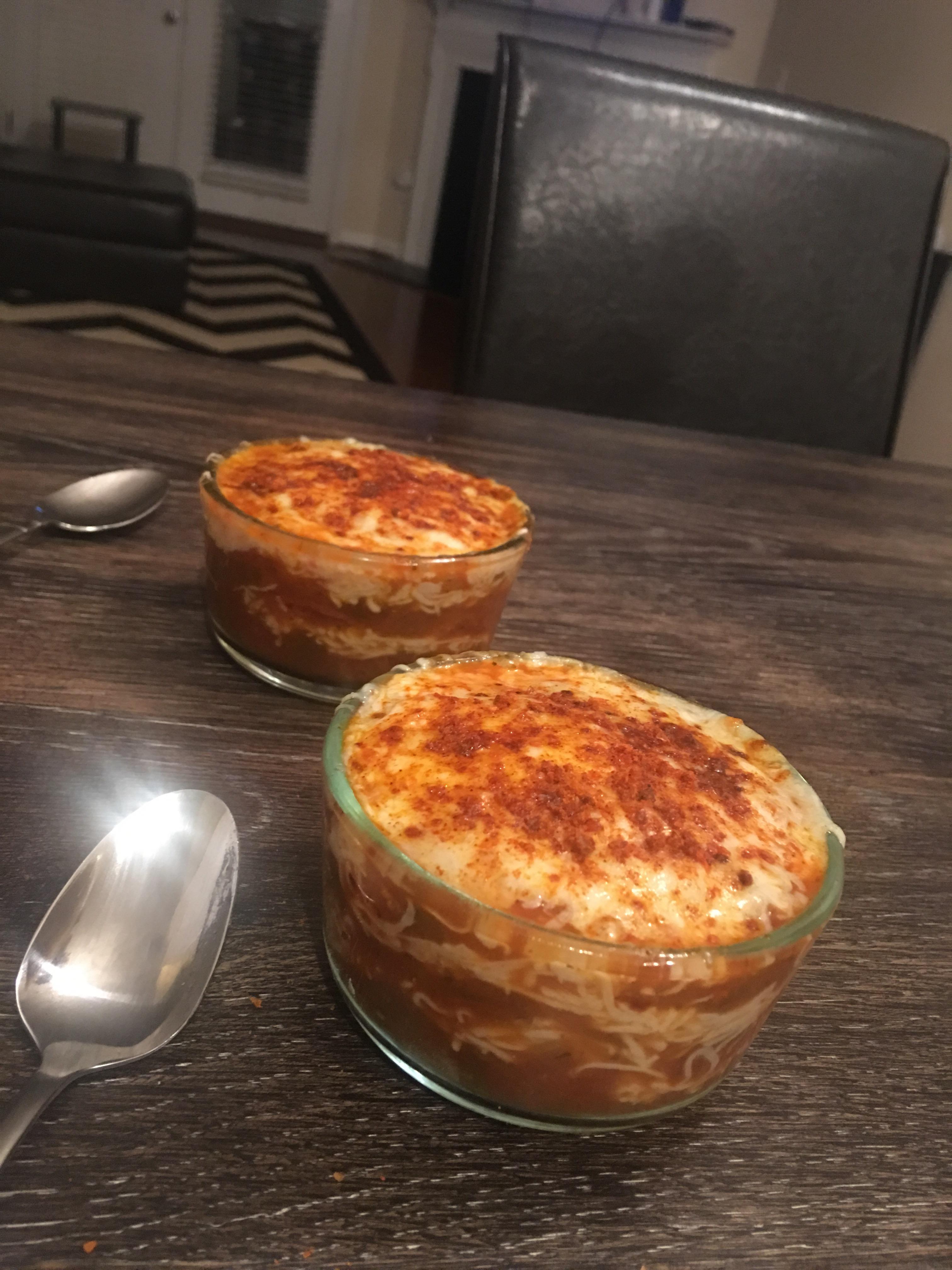 Pizza topping bake salsa, buffalo sauce, mozz cheese, pepperoni and garlic sriracha seasoning