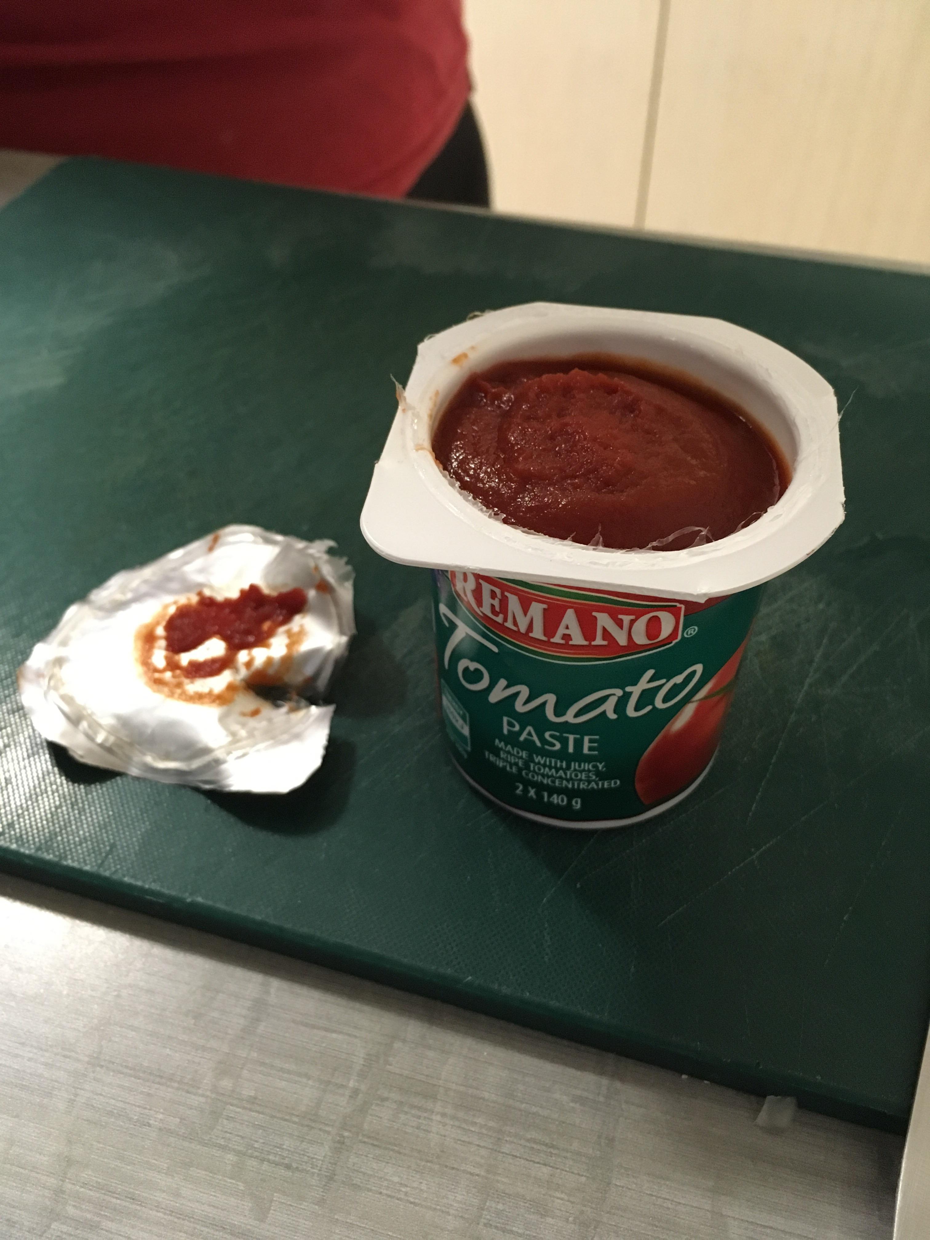 My wife peeled the top off an Aldi tomatoes paste thing, without