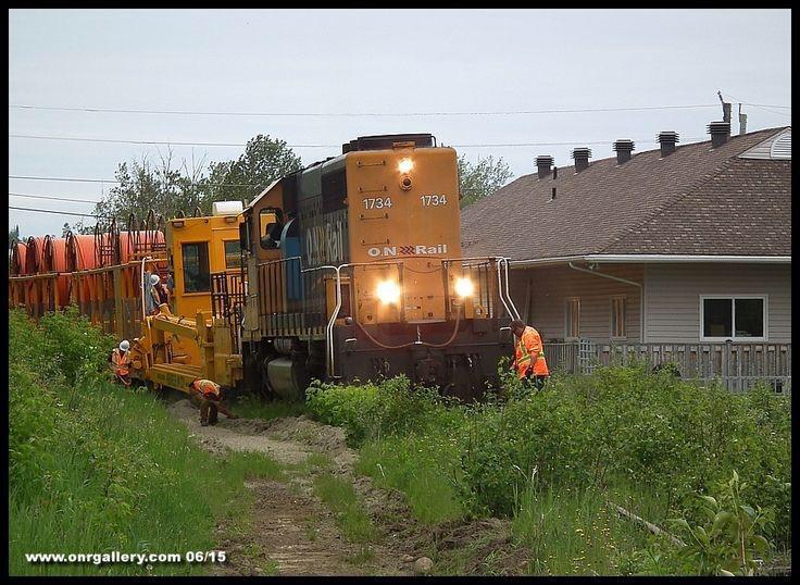 Ontario Northland SD402 laying fibre optics cable on the abandoned section of the Ramore