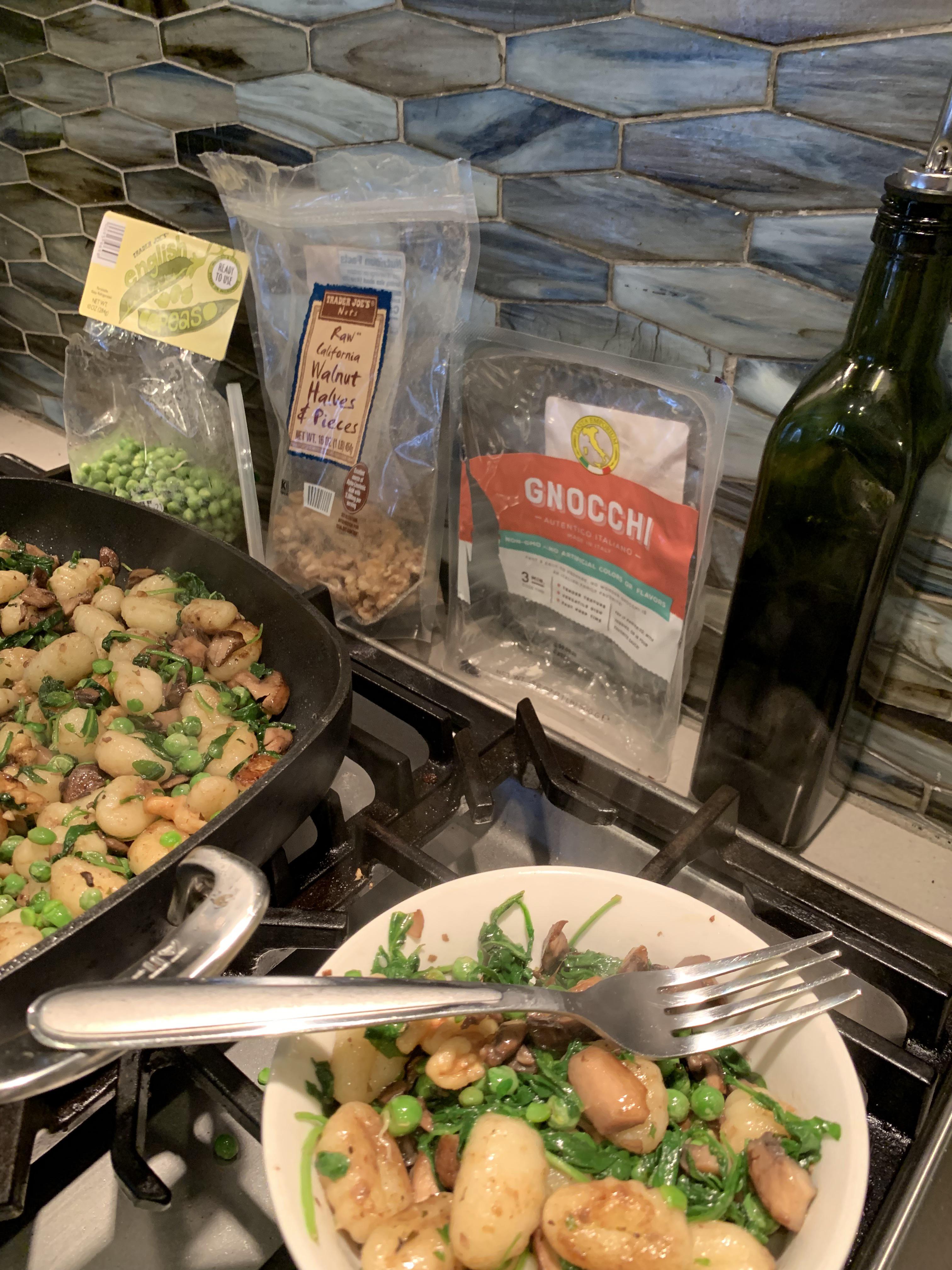 Pan fried TJ gnocchi with Wild arugula, cremini mushroom, walnuts and