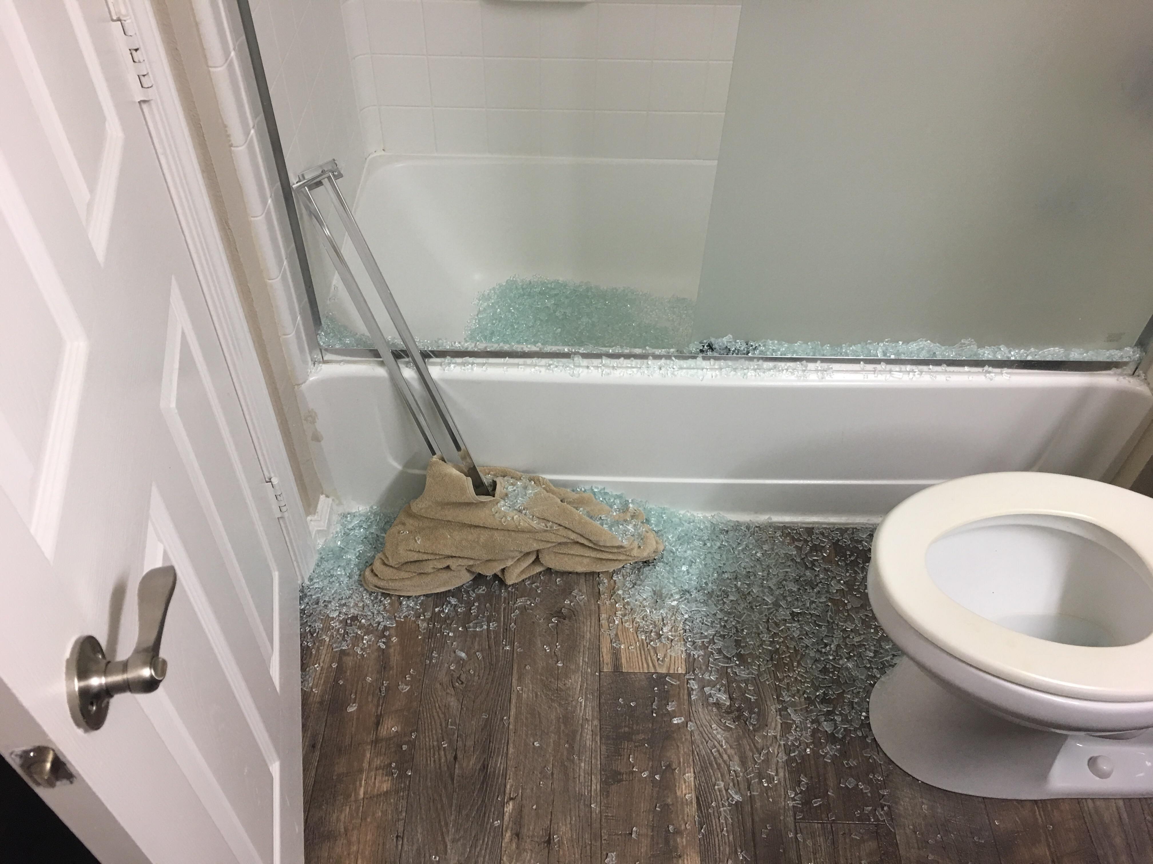 The glass shower door in my brother's apartment fell off while he was