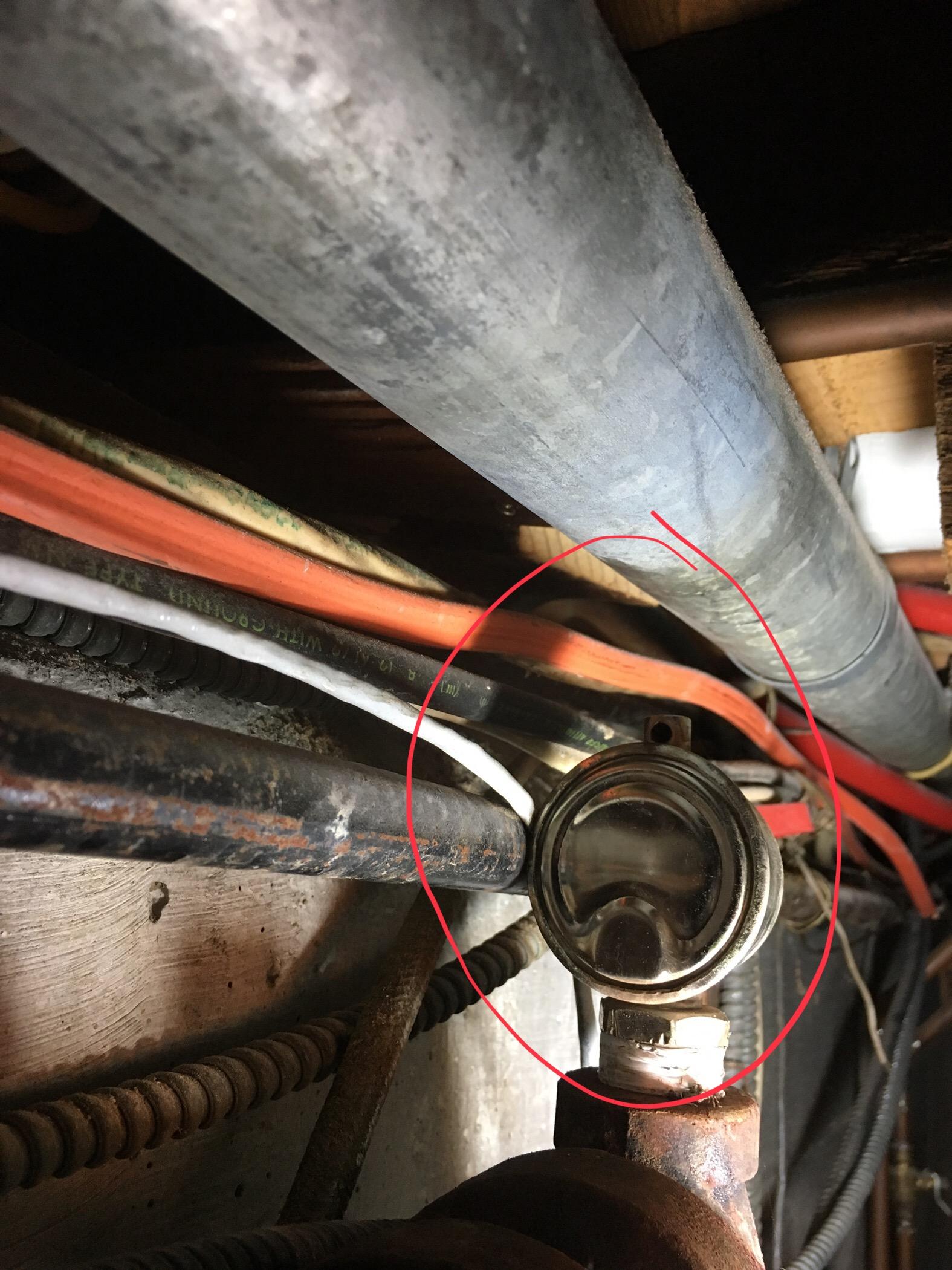 Loud hissing steam coming from pipe in basement. from the hole