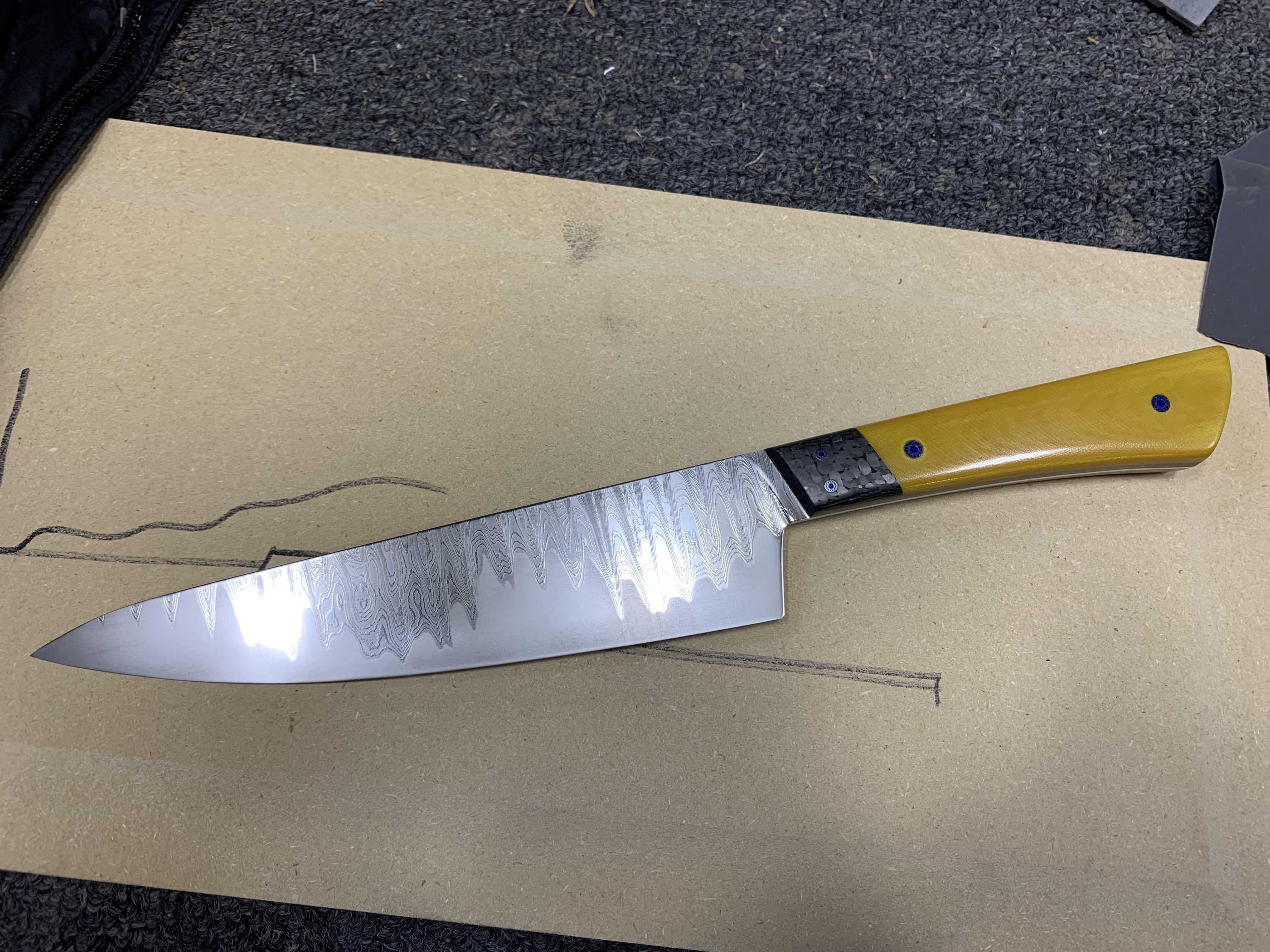 Just finished this one up. Vintage linen micarta and carbon fiber. Tang