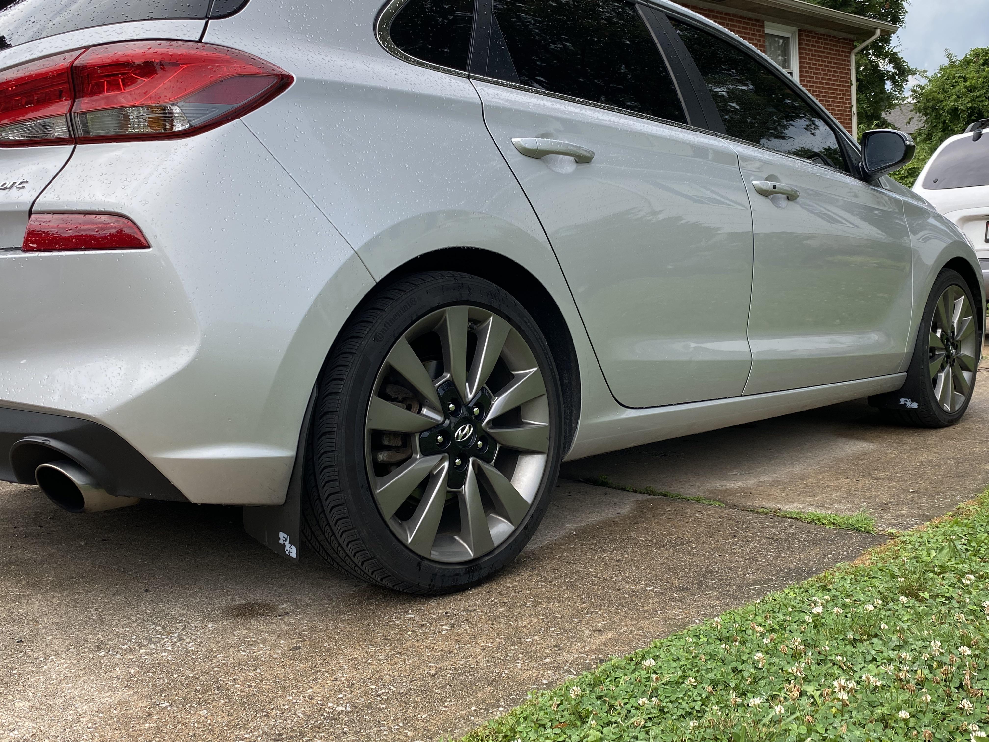 Added some mud flaps, cleaning tar off the rocker panels sucks. Simple