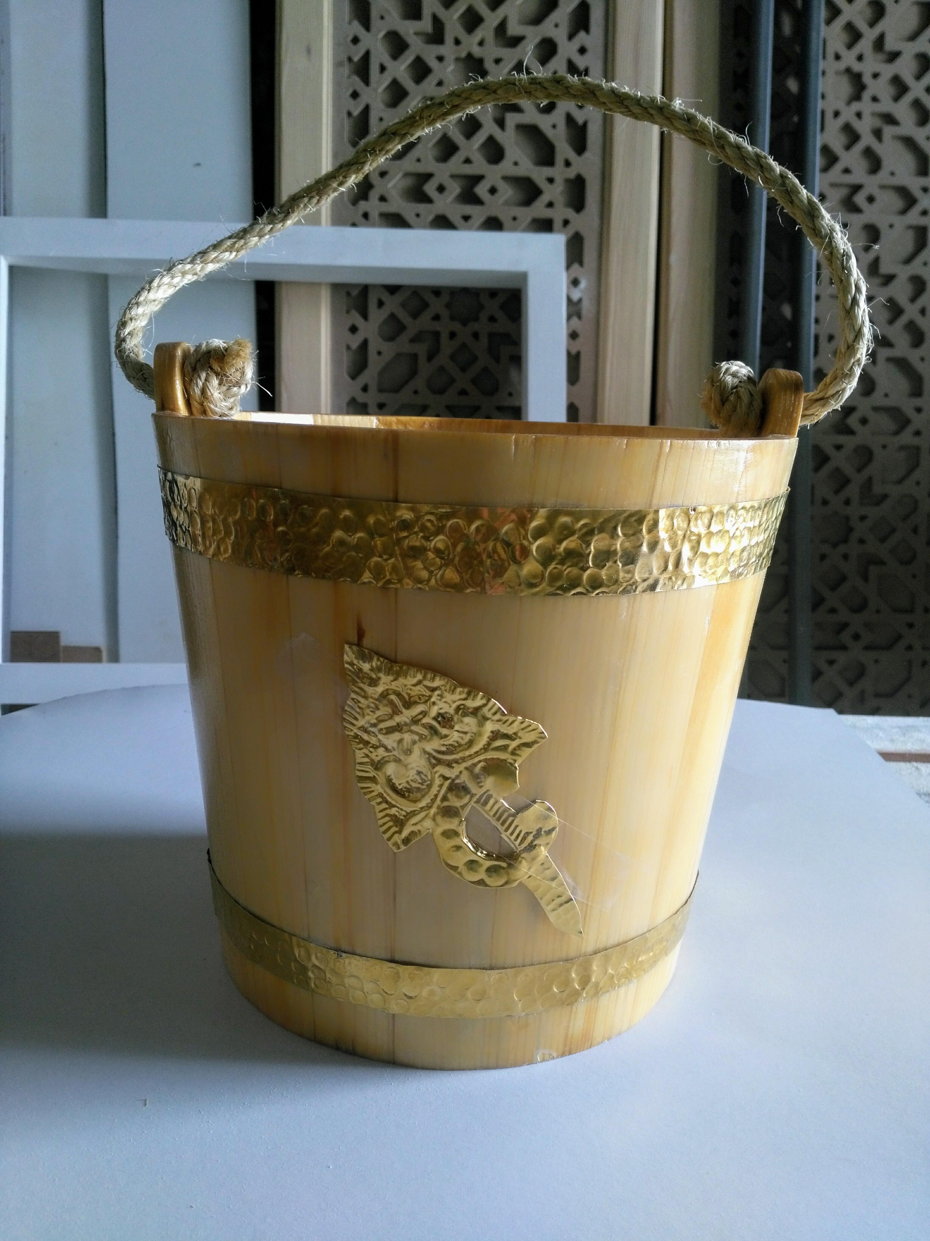A handmade wooden bucket by me by the way it's a natural wood any