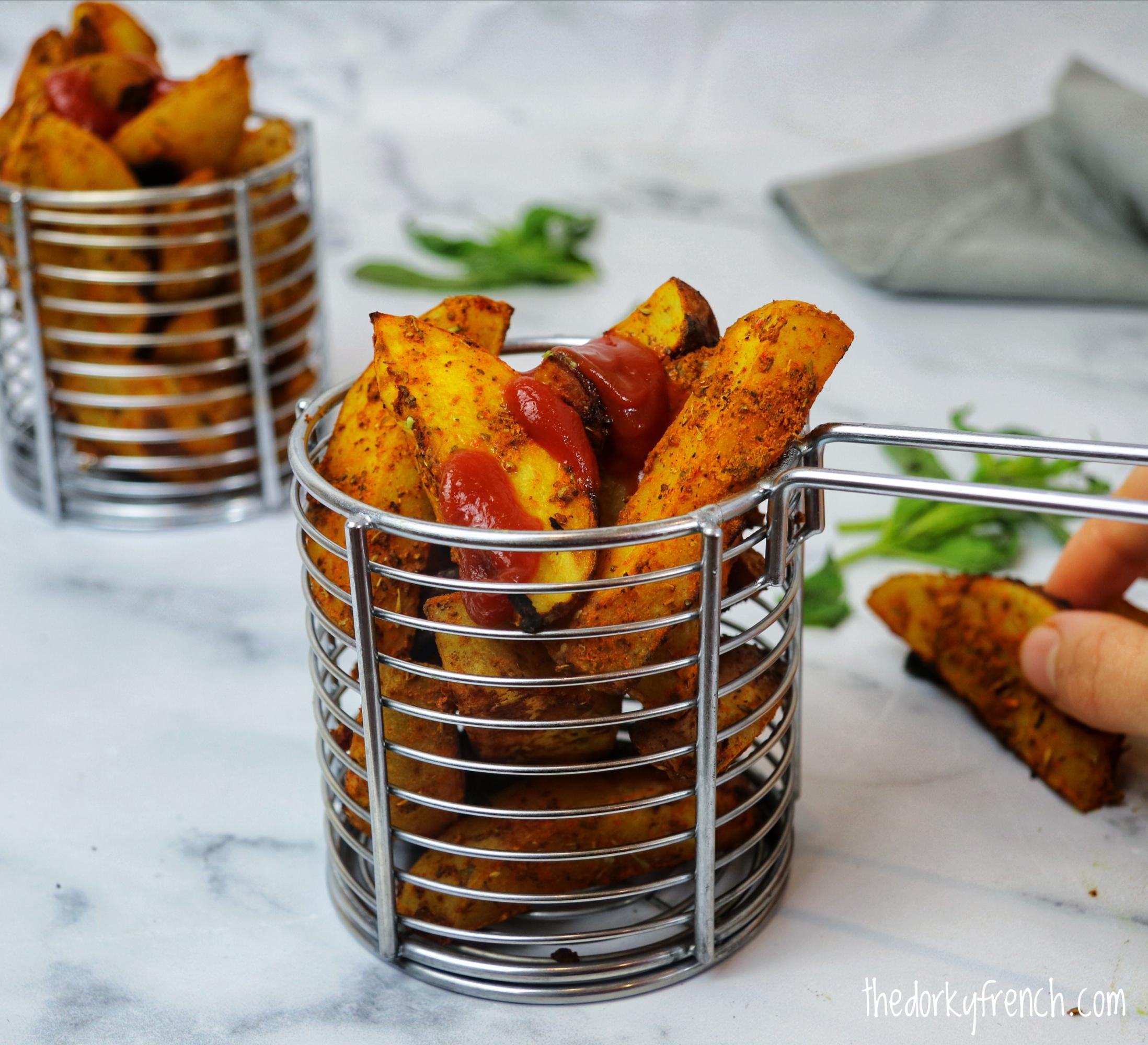 Oven baked healthy and oilfree potato chips with ketchup and Siracha