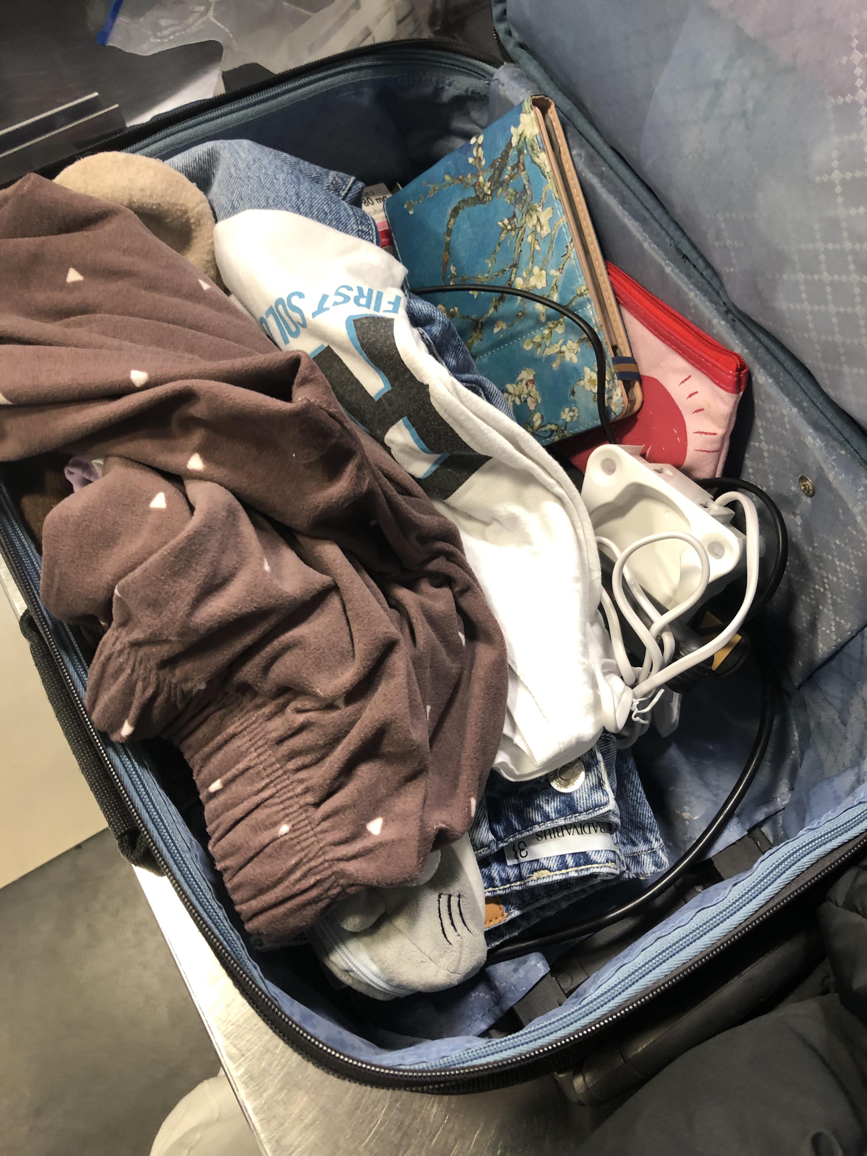 My suitcase after going through airport security r/mildlyinfuriating