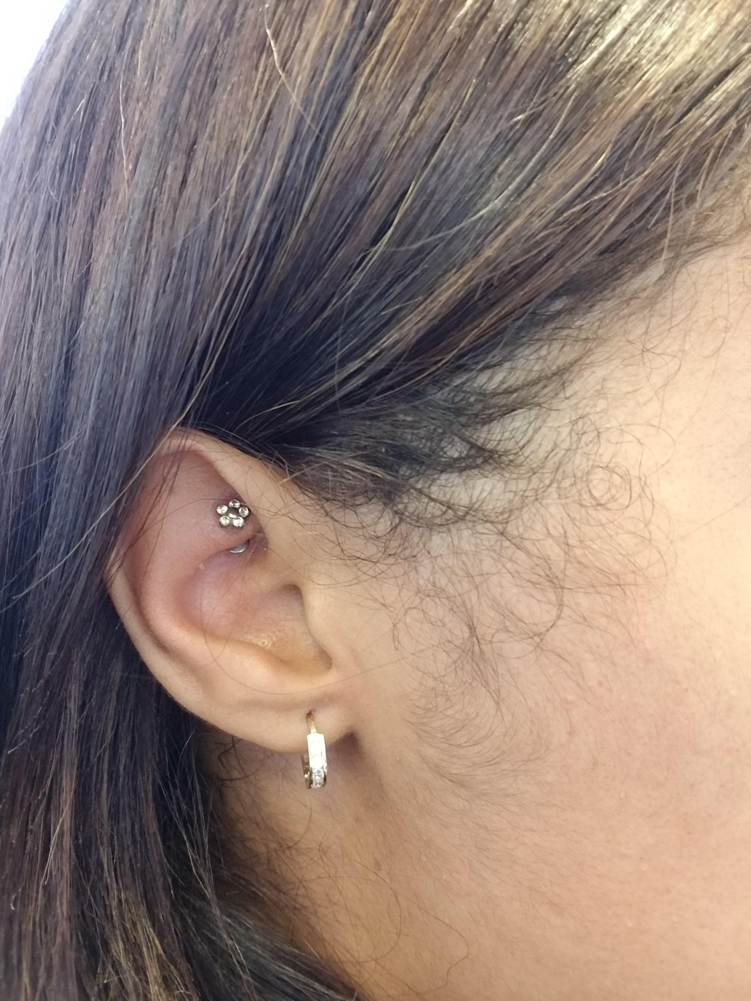 2 year old rook piercing. Still a bit swollen and often hurts/irritated