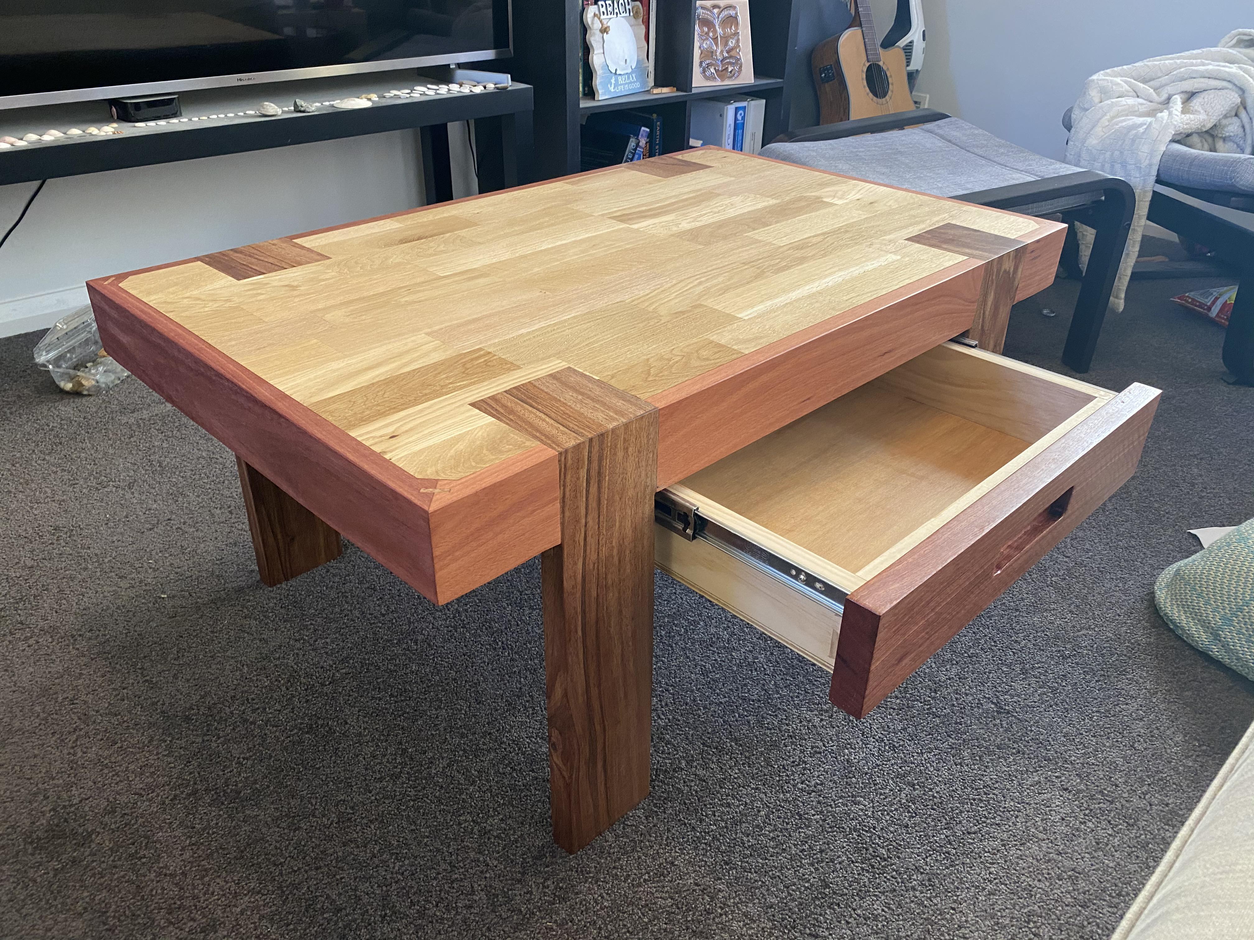Jarrah, durian, and Tasmanian oak coffee table with splined miters