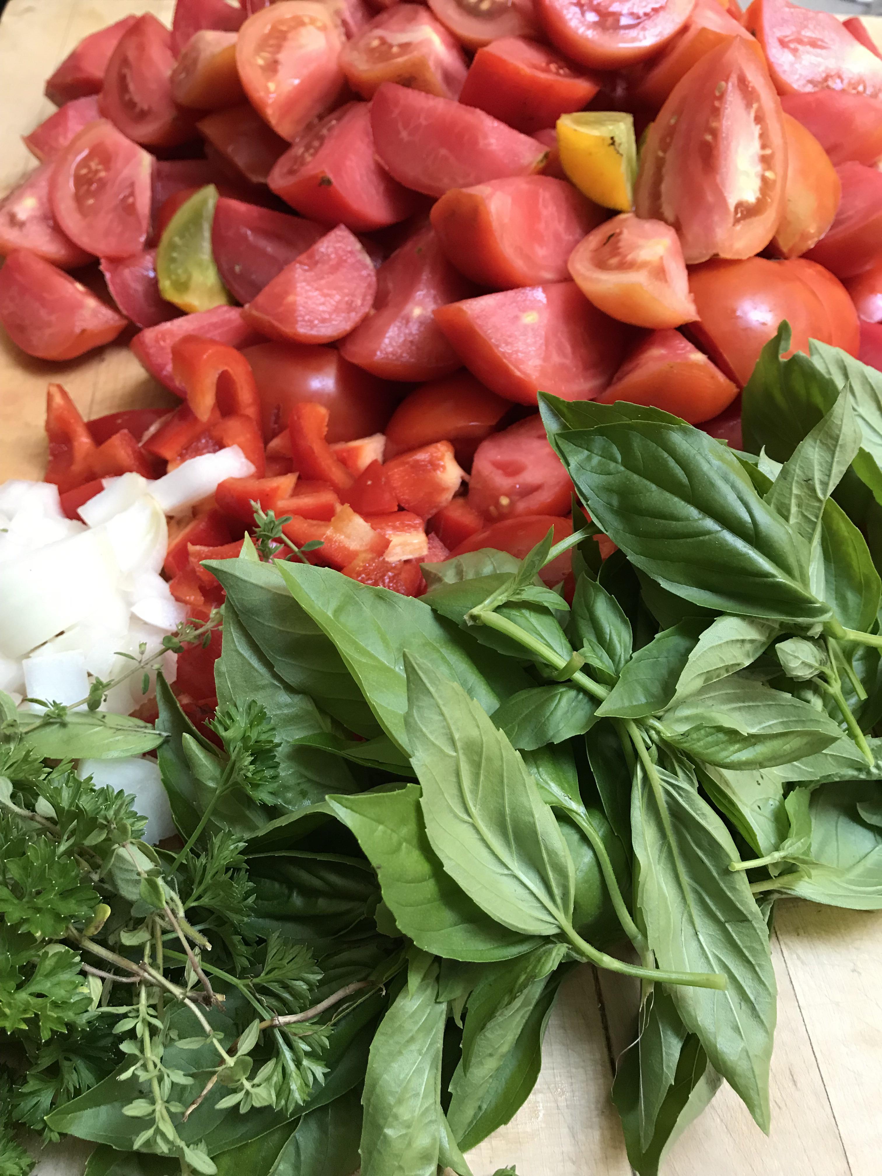 Harvest for tomato sauce from my dads garden! r/gardening