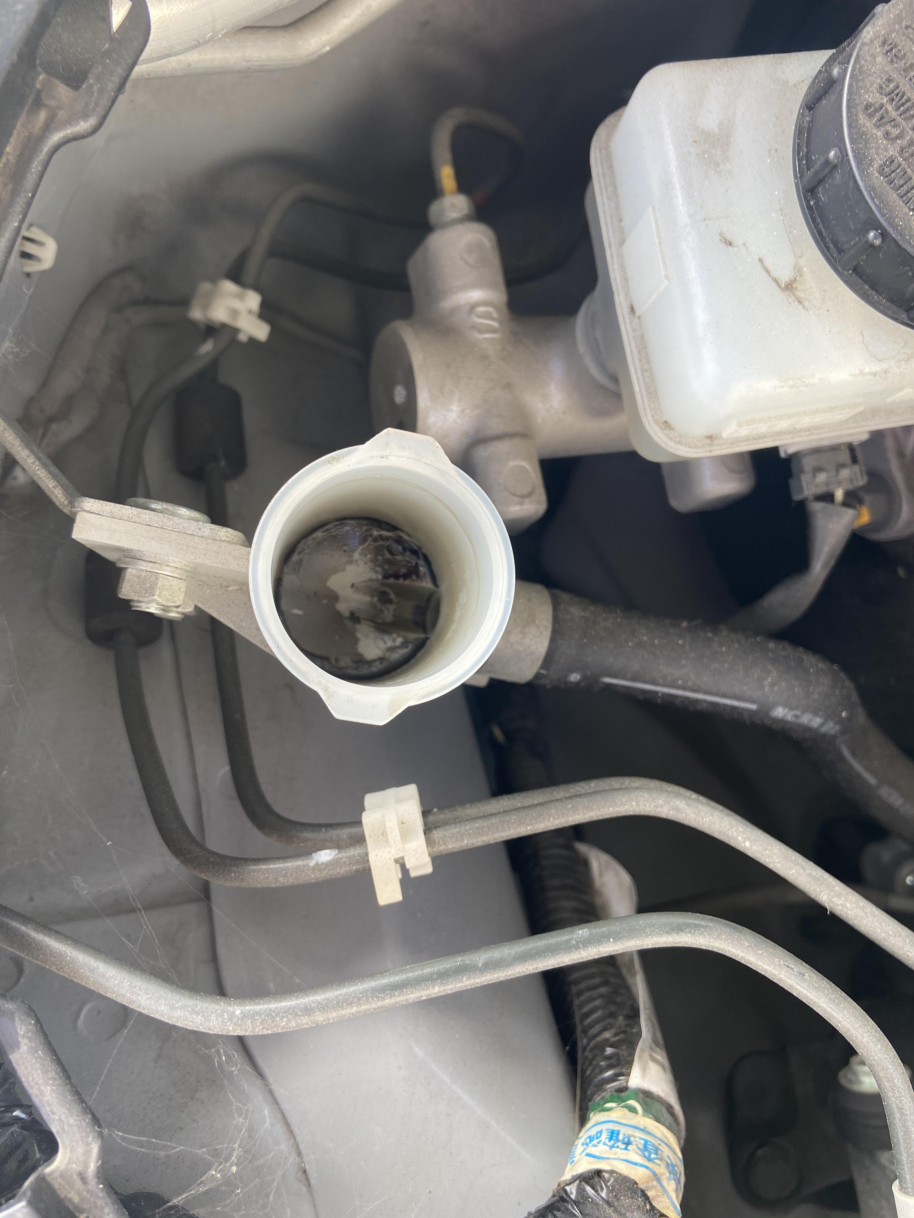 Clutch has no pressure and sticks to the floor. Reservoir was dry so I