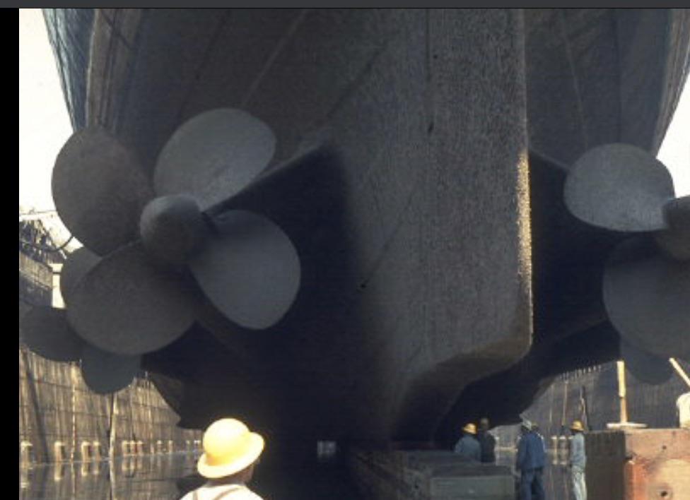 Queen Mary in dry dock ready to get her propellers removed and her
