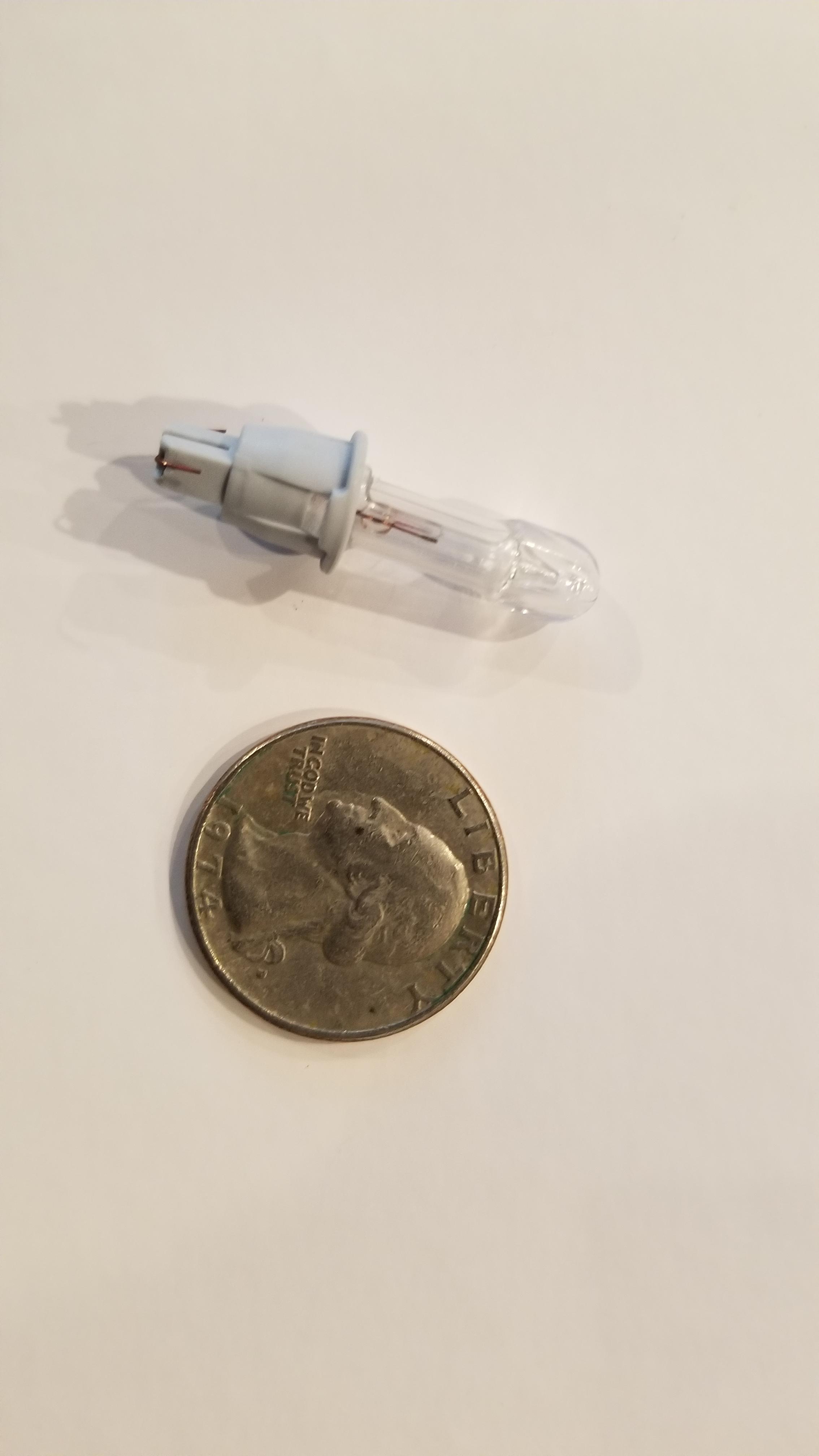 What is this bulb from our Christmas light string. All of the other lights have a green base and