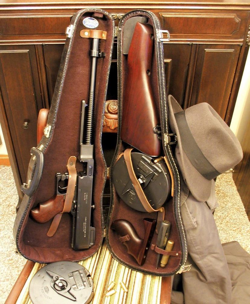 1921 A classic American Tommy Gun in a custom violin case. (Thompson