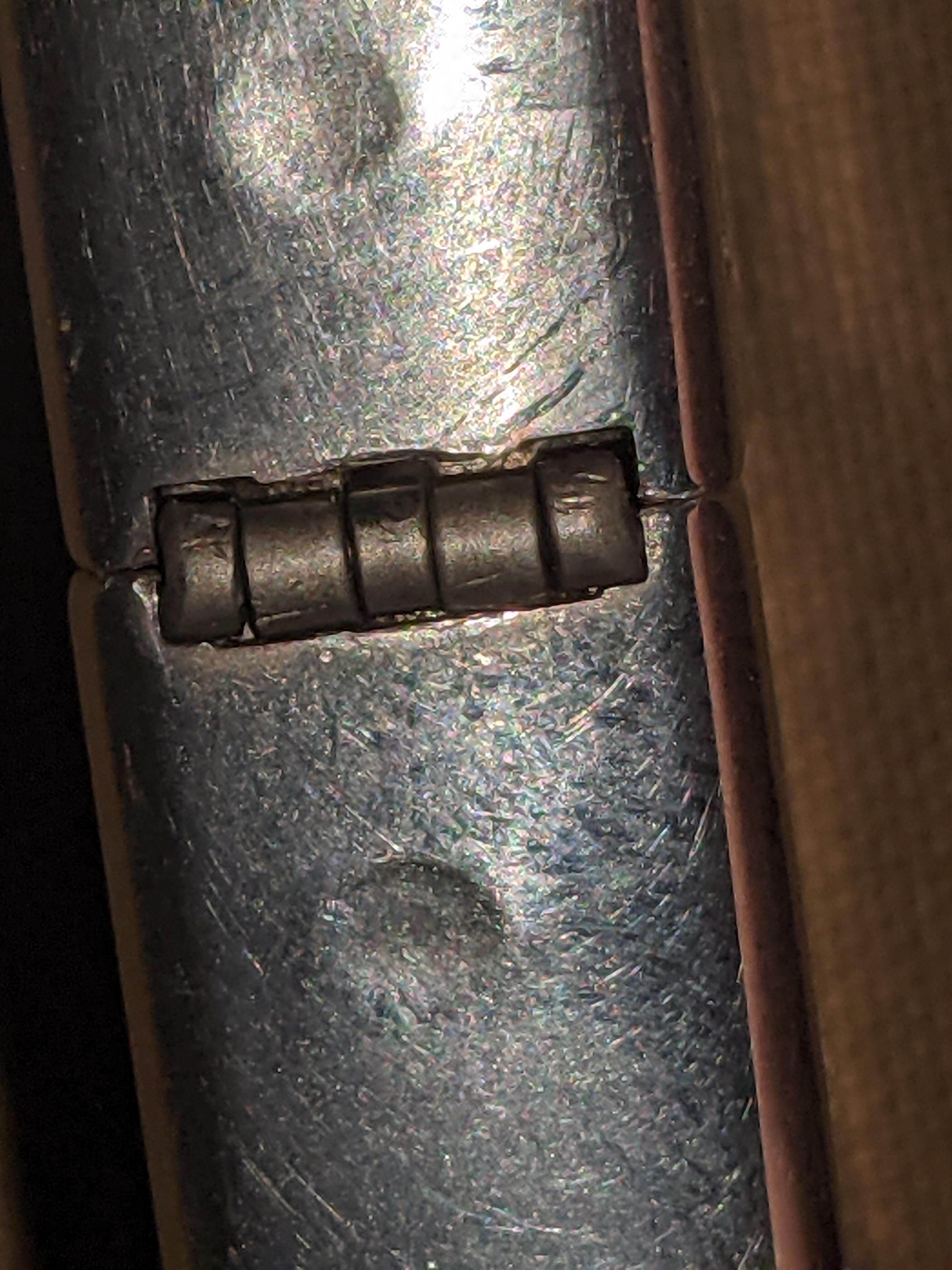 Should I send this in to zippo and can they fix it? Hinge semi cracked