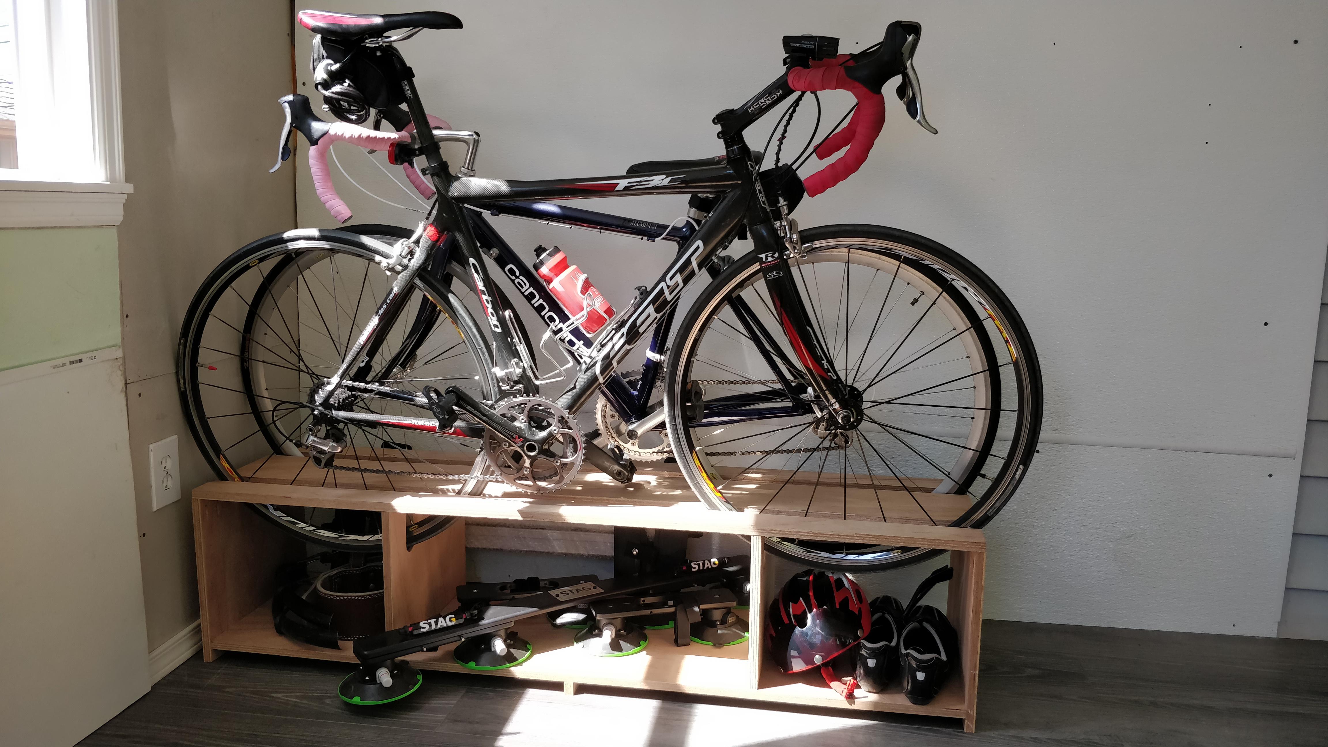 First big woodworking project a bike rack with cubbies! Modified a plan by Woodbrew to hold an