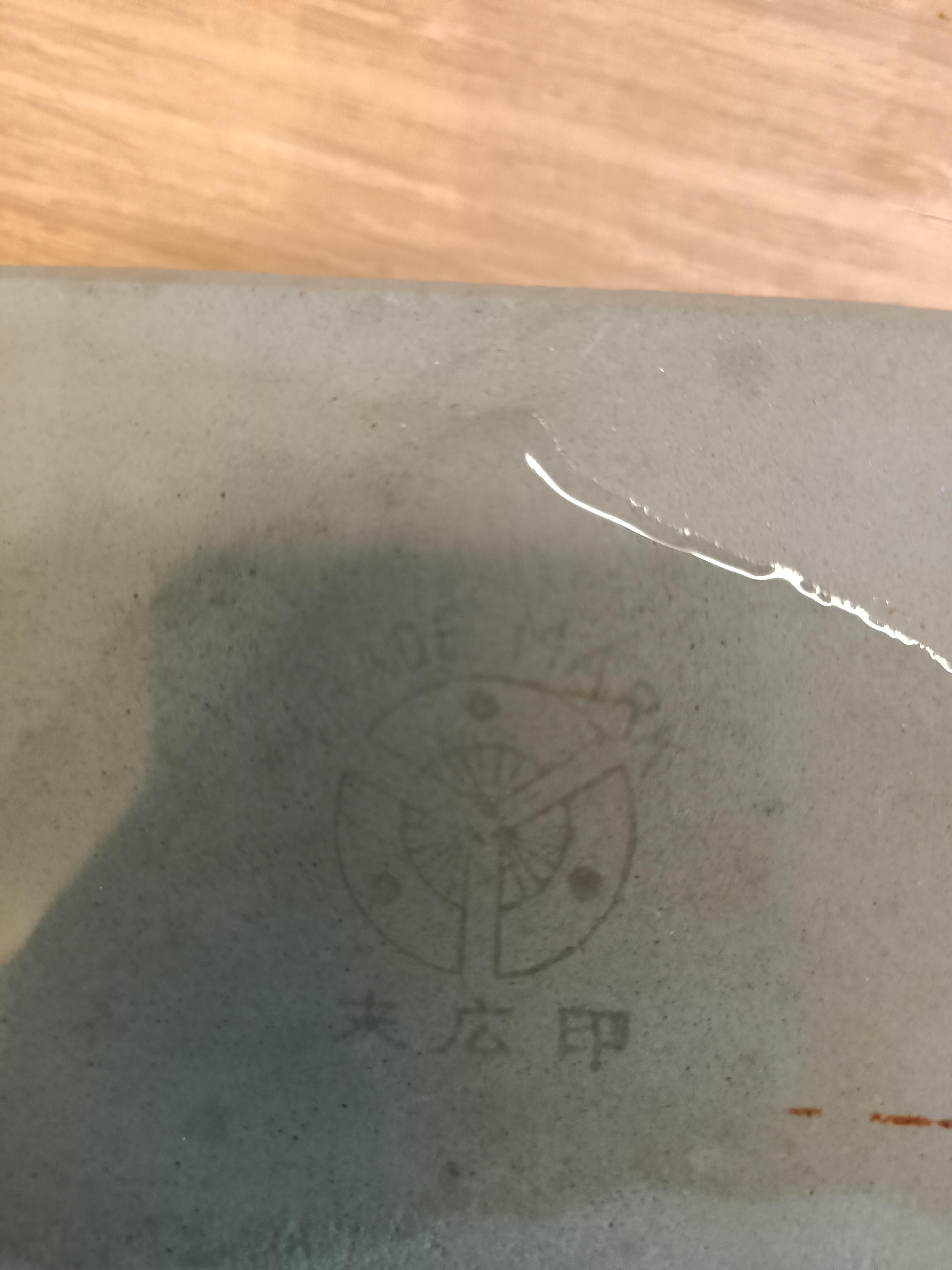 [japaneseEnglish] what does the kanji at the bottom mean? Thanks r