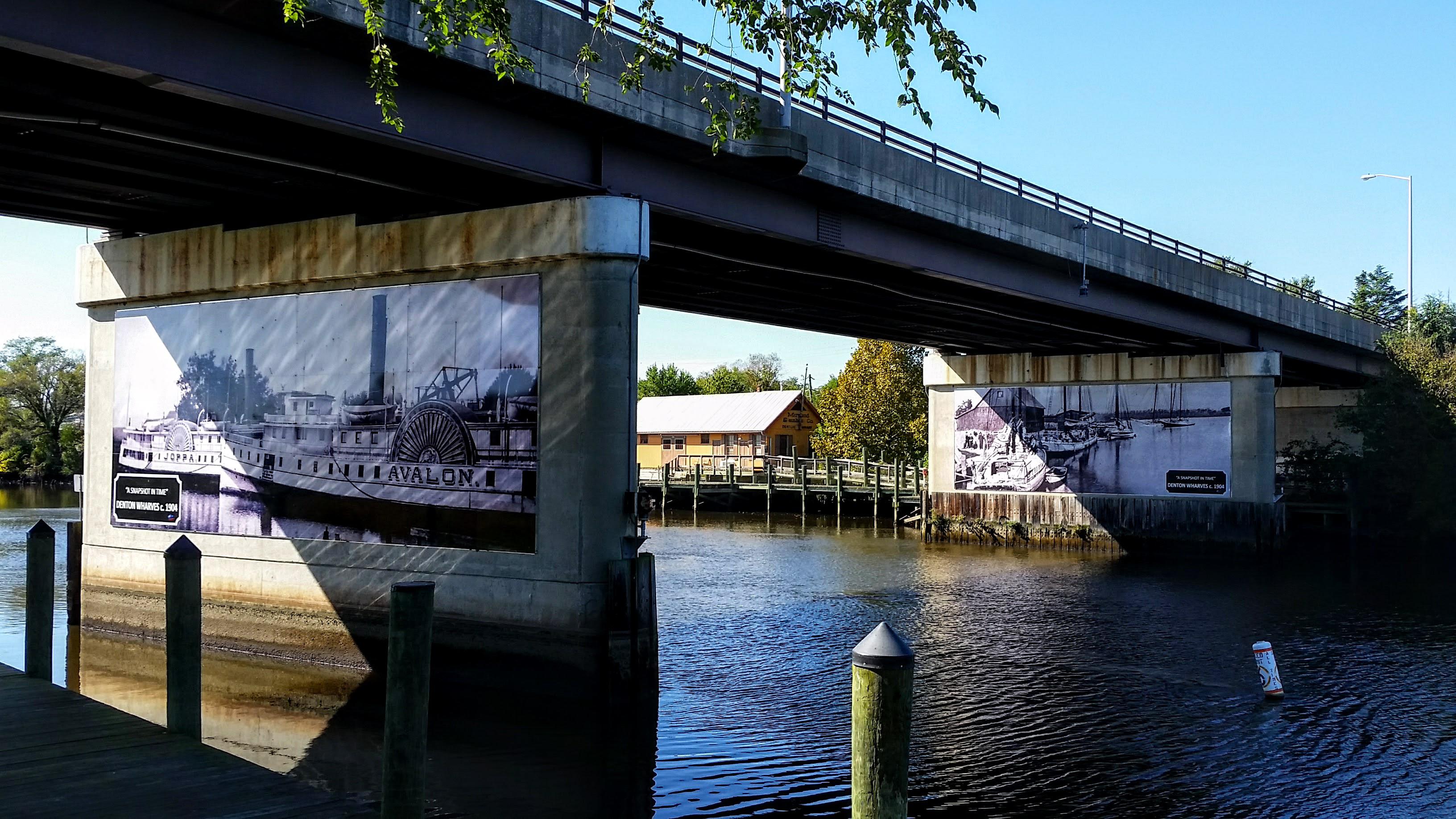 The docks of Denton under the Bus 404 Choptank River bridge. Left