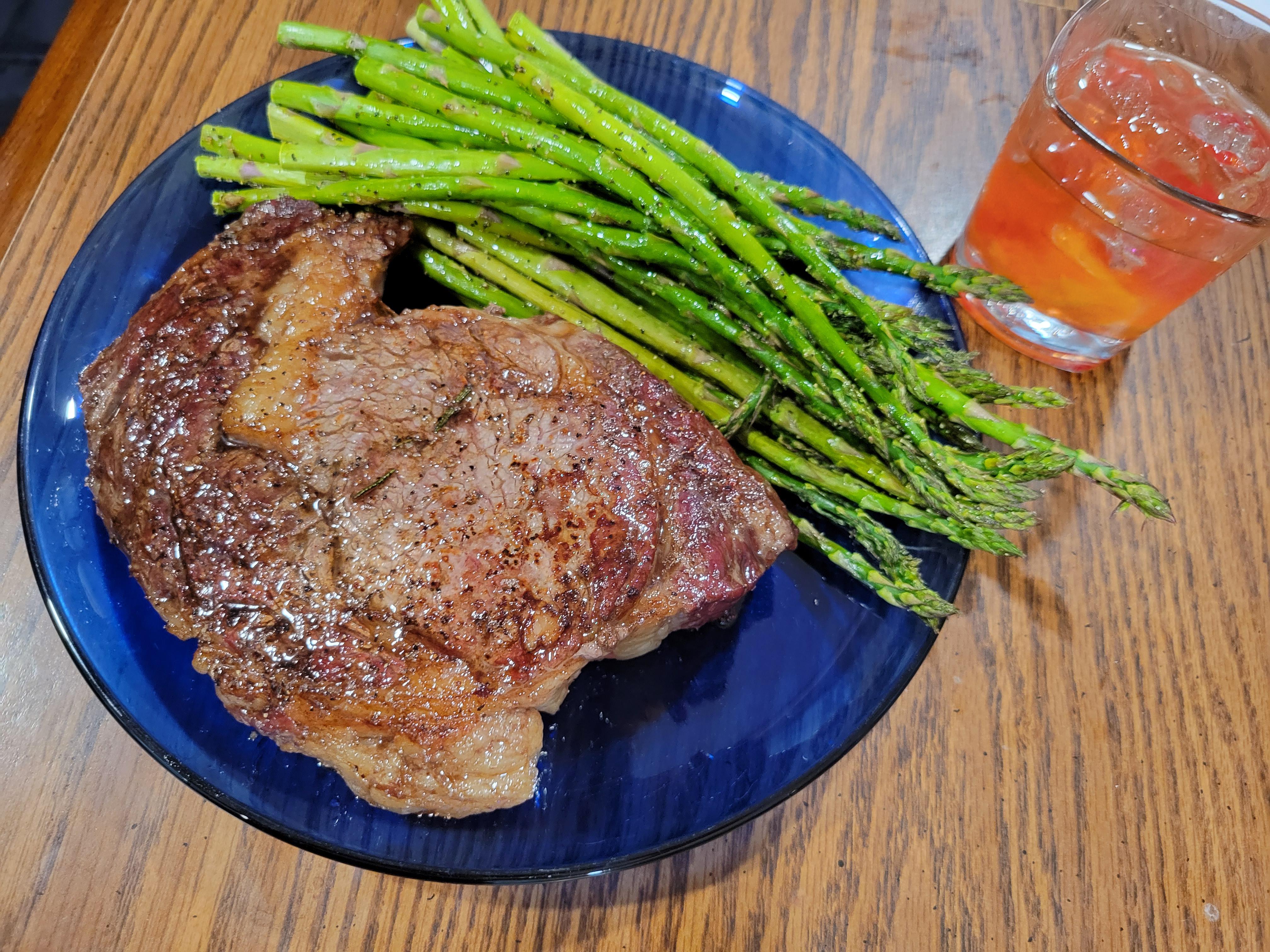 Reverse sear delmonico ribeye, oven roasted asparagus, and an old