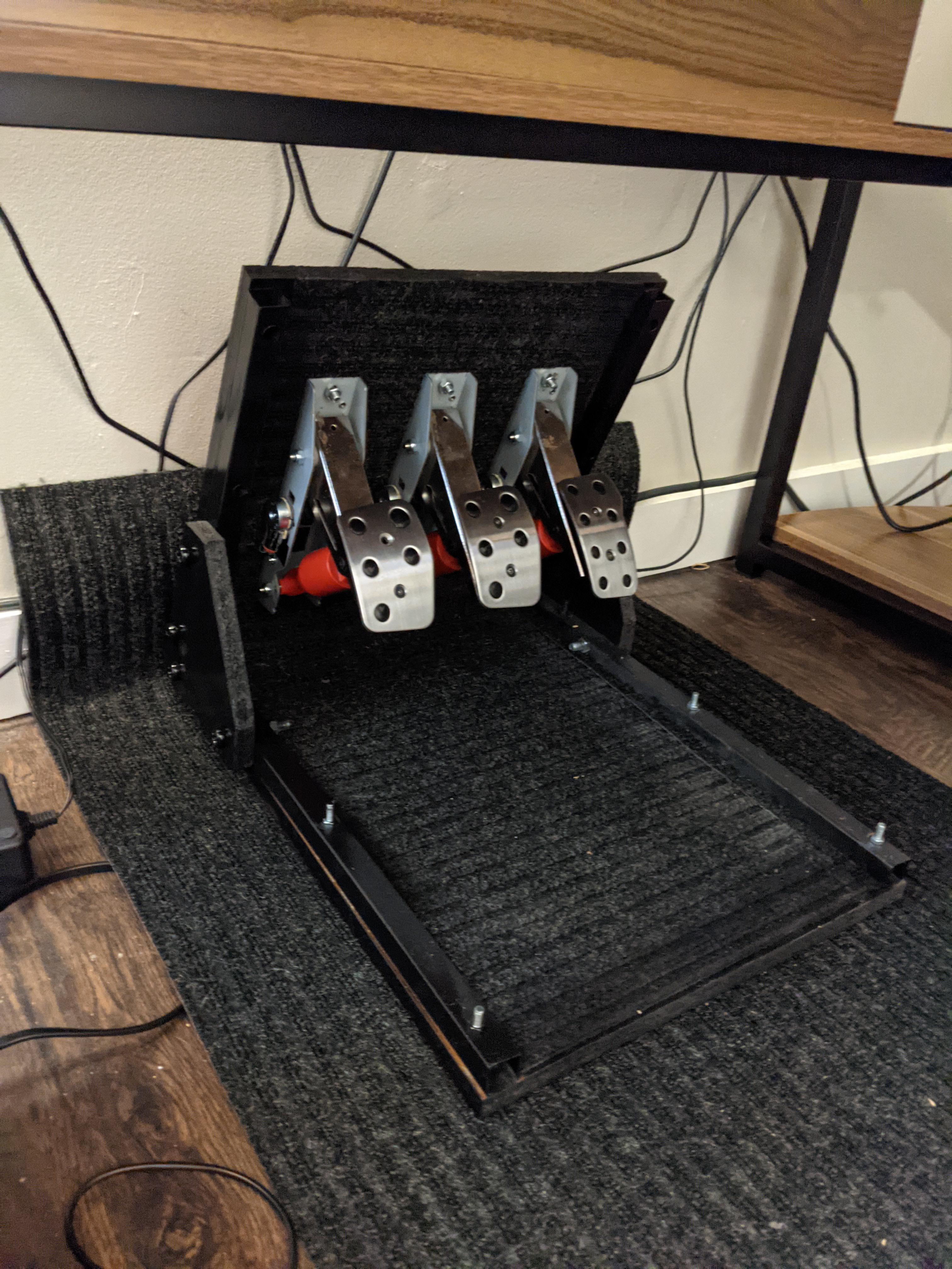 Put together an inverted pedal mount with the wood and metal from an