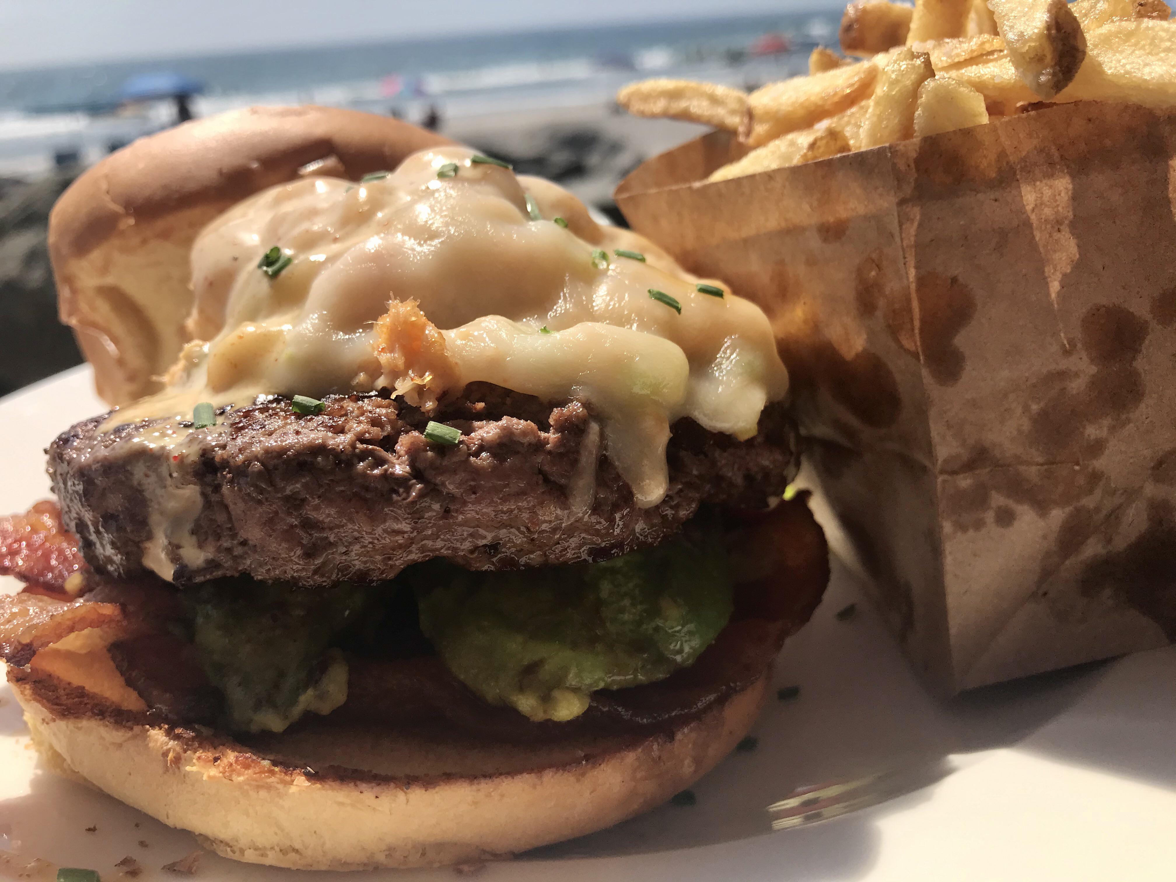 Lobster, crab, and shrimp in top of a medium rare burger r/burgers