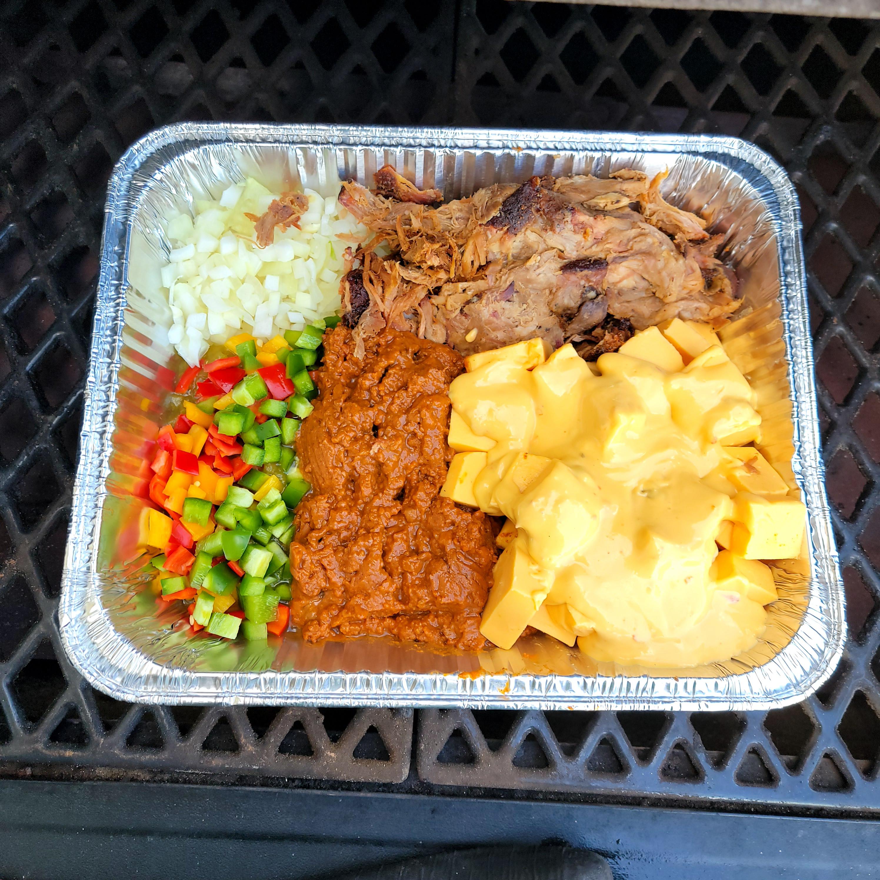 Pellet grill queso with smoked pulled pork r/pelletgrills