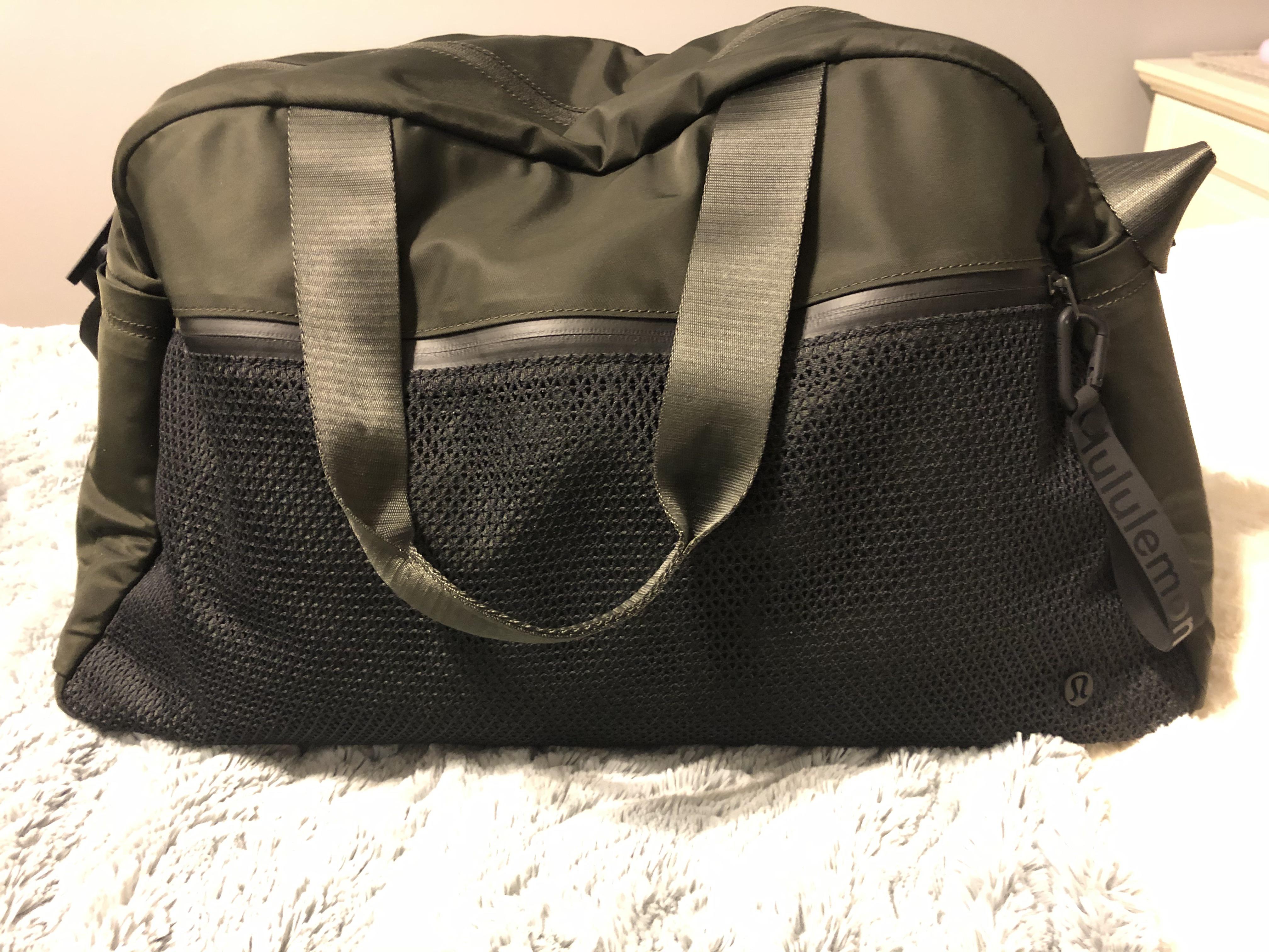 WMTM “All Hours Duffel” in dark olive/black. Love this overnight bag. It fits a lot more than my