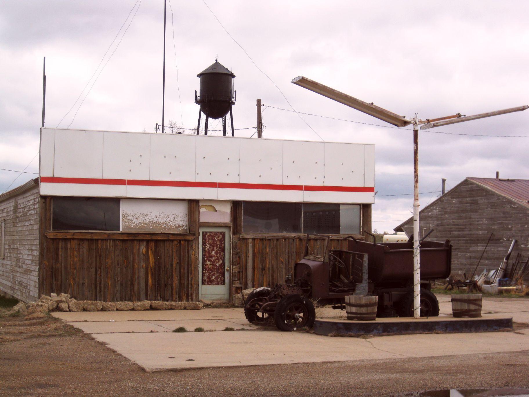 Abandoned gas station, Medicine Bow, Wyoming, US (population 270), this