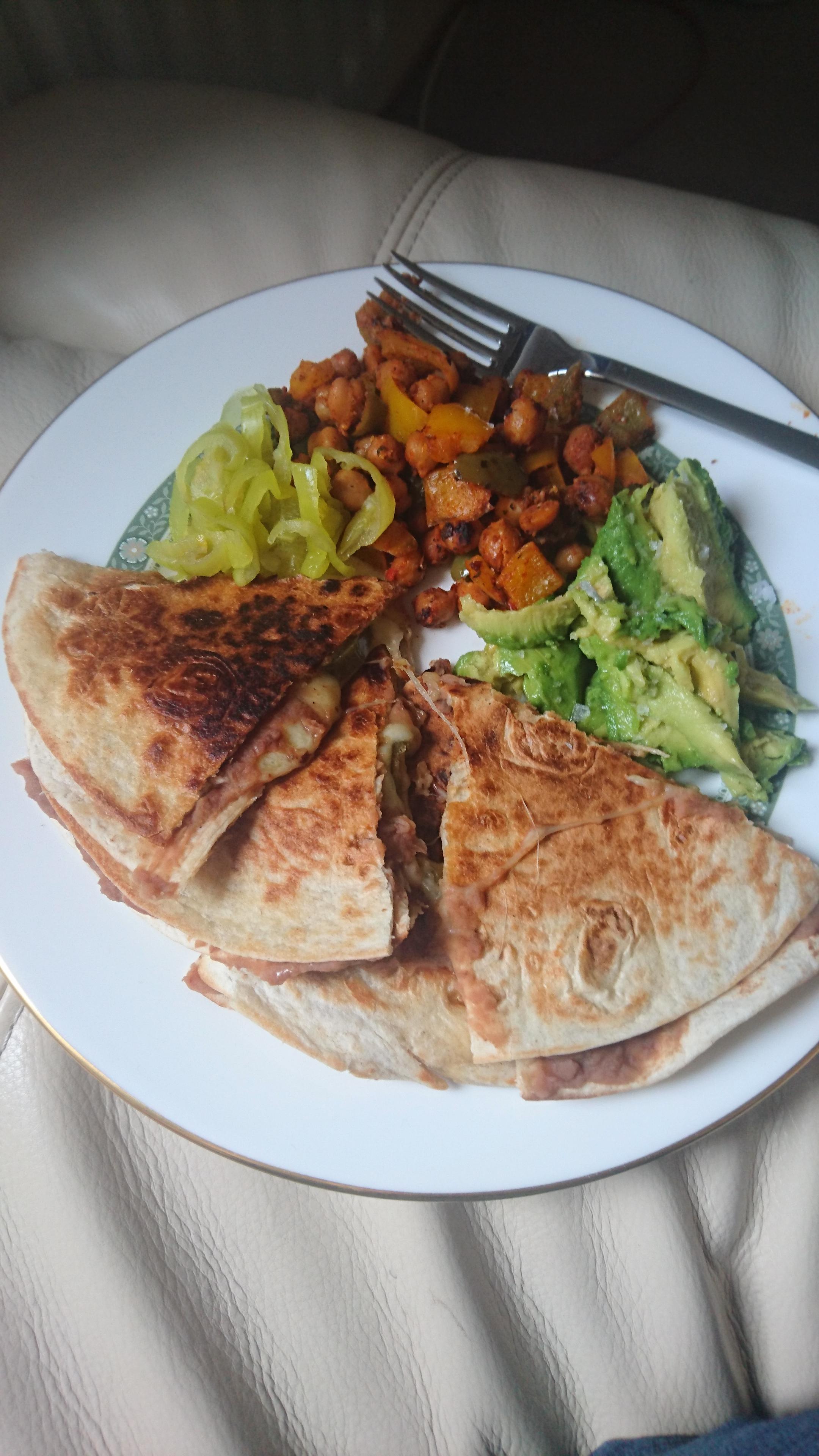 Bean and cheese quesadilla with chickpea pepper salad, avocado and